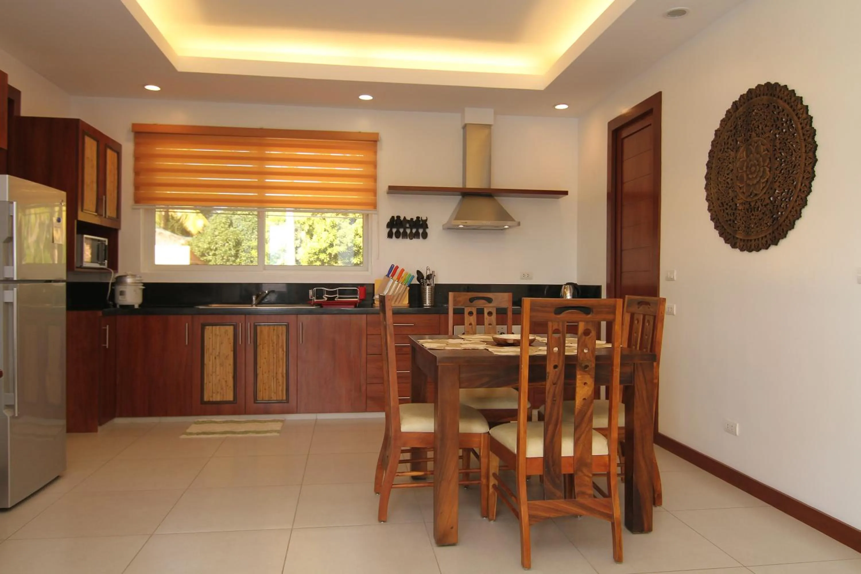 Kitchen or kitchenette in Vida Homes Condo Resort