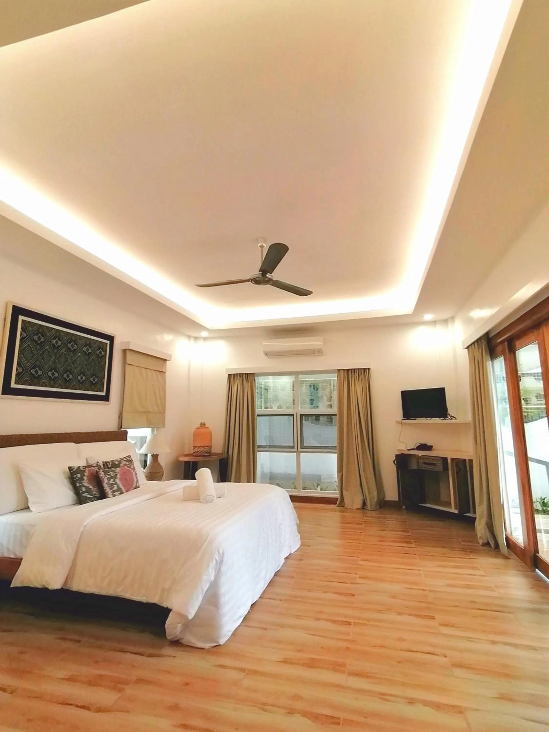 Bed in Vida Homes Condo Resort