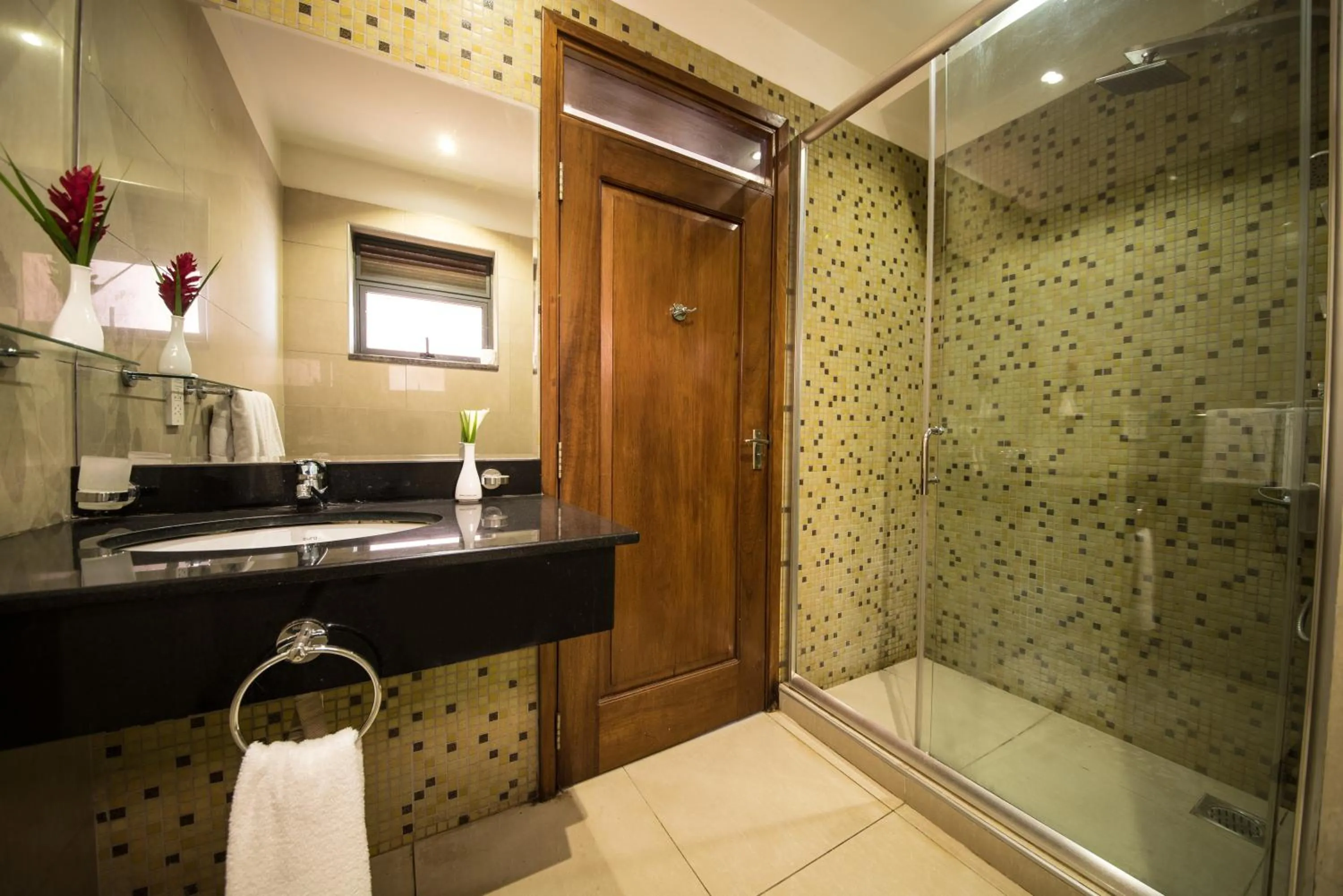 Shower in Bukoto Heights Apartments