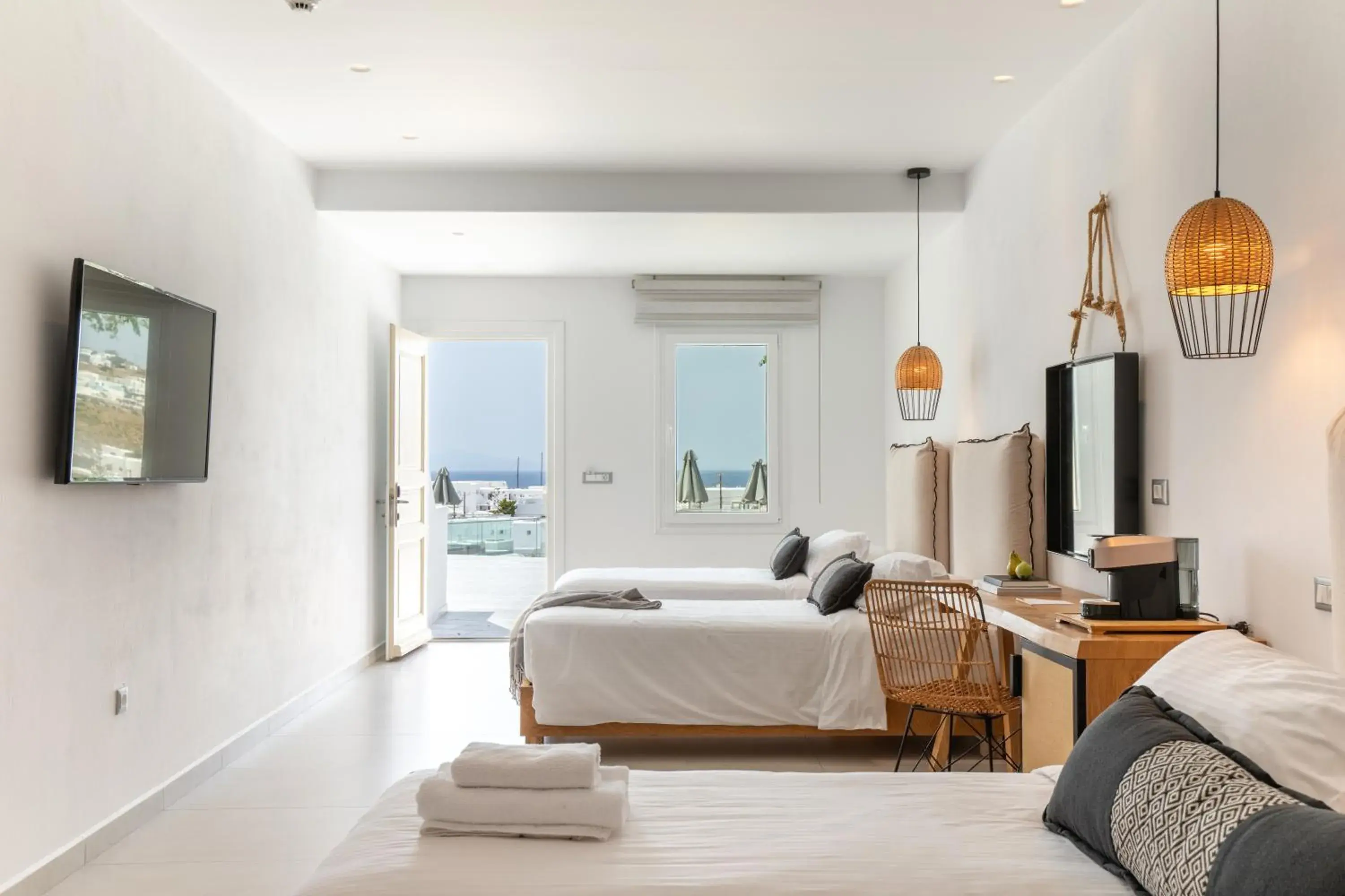 Quadruple Room with Sea View in The George Hotel Mykonos Quadruple Room with Sea View in The George Hotel Mykonos