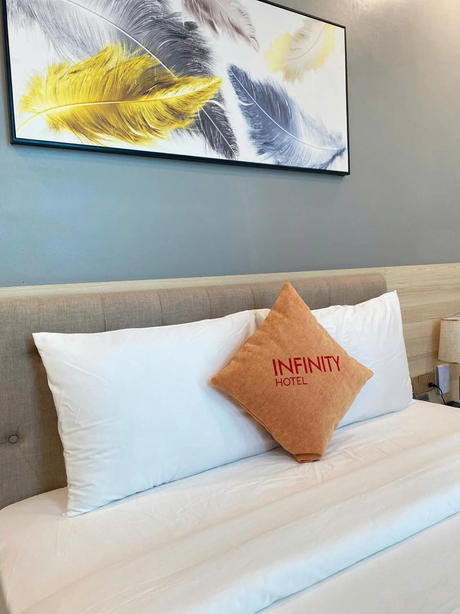 Bed in Infinity Hotel