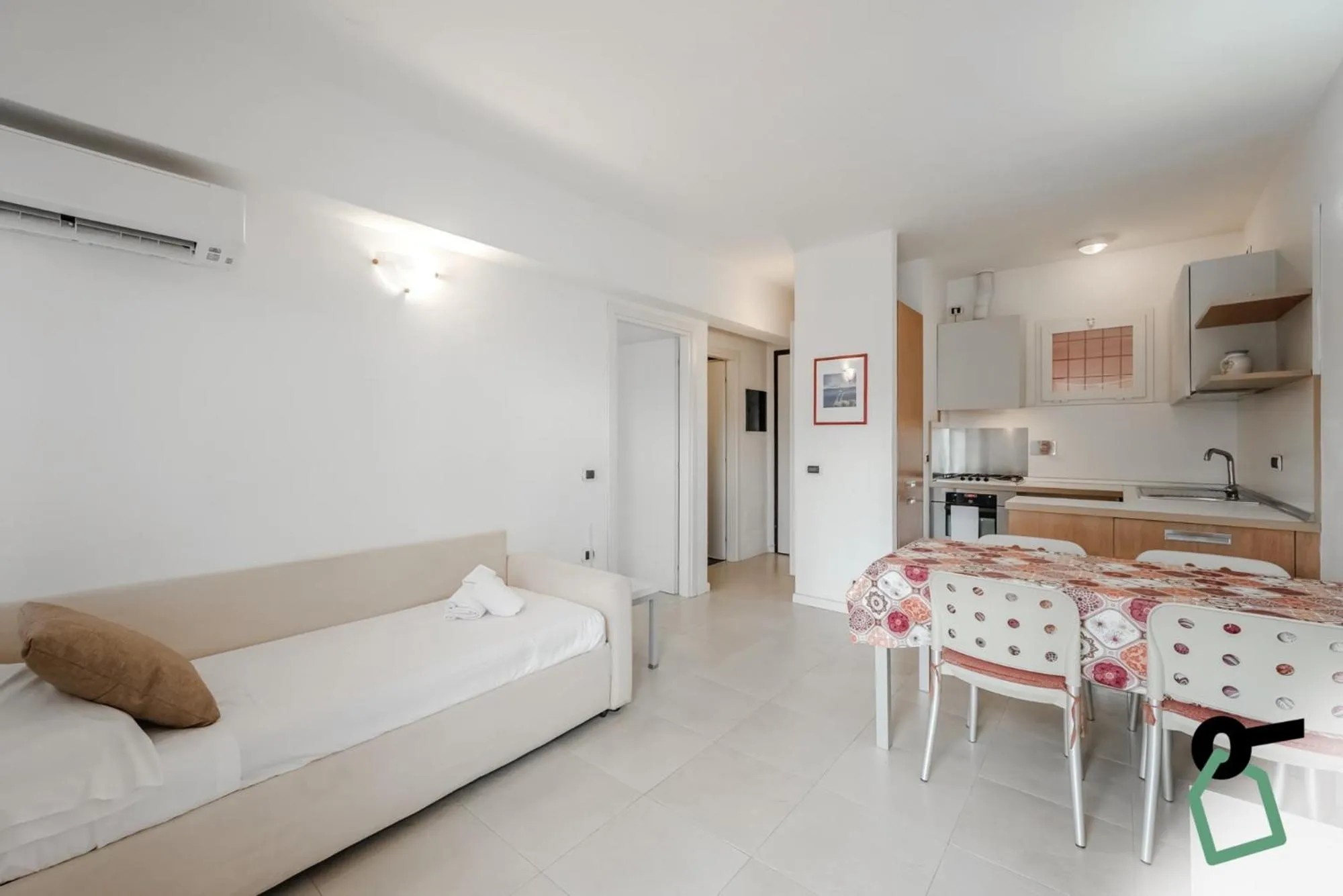 Living room, Bed in Hotiday Apartments Portoferraio