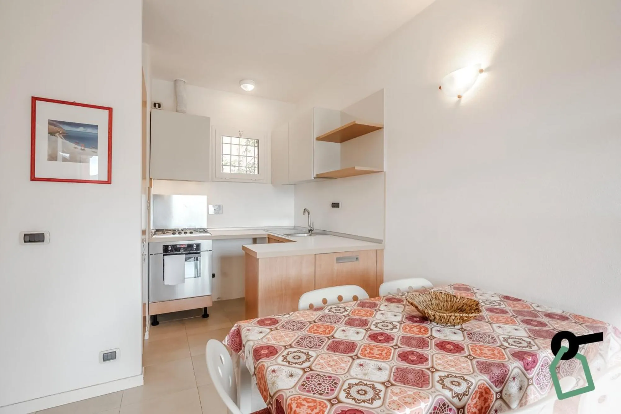 Kitchen or kitchenette, Bed in Hotiday Apartments Portoferraio