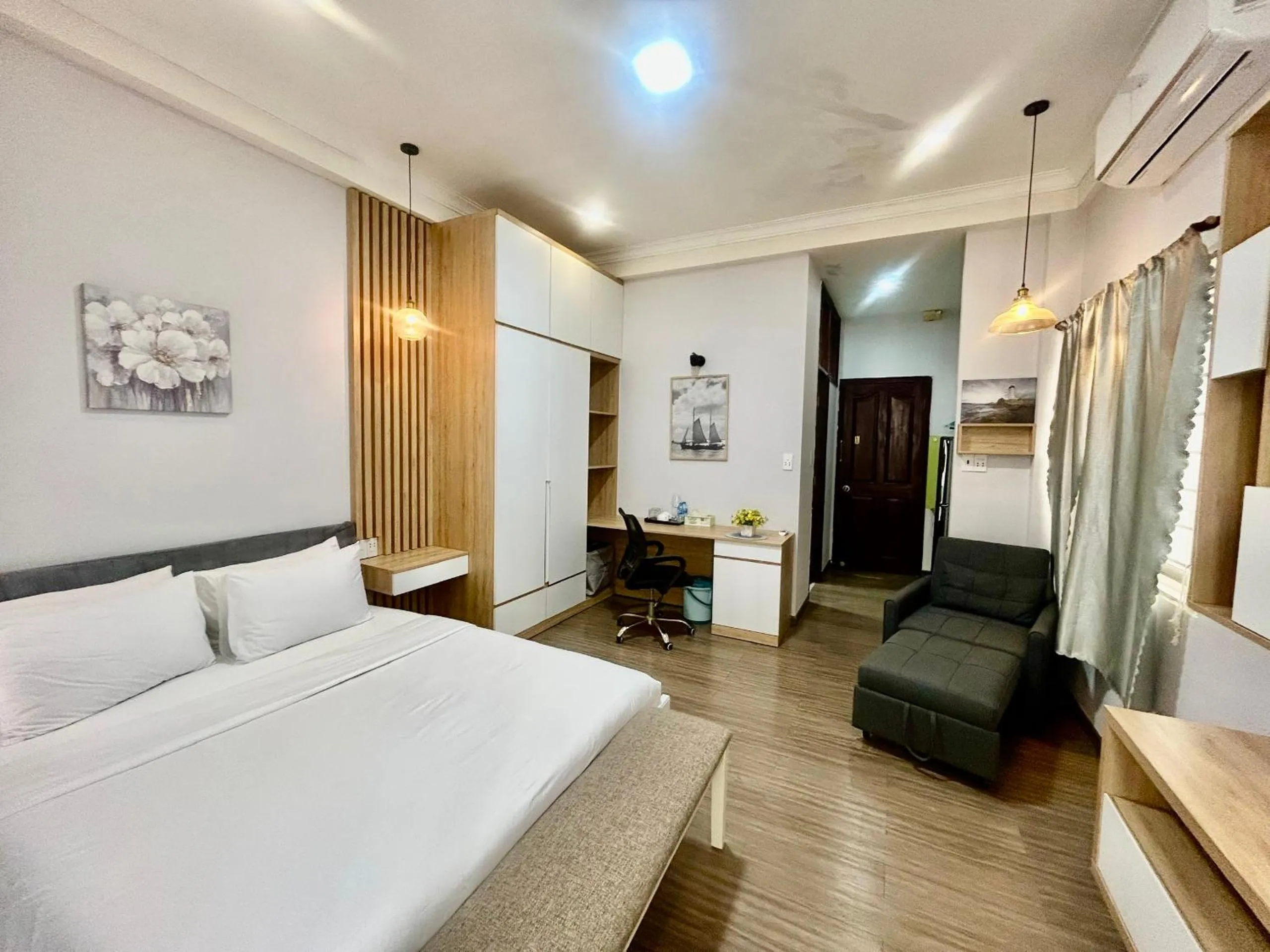 Photo of the whole room, Bed in Convinia Home - Truong Quyen