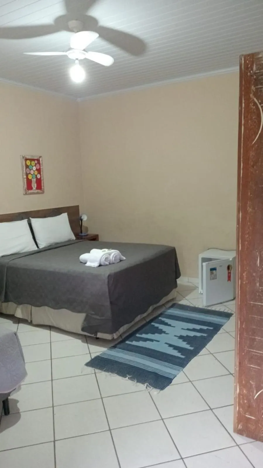 Bed in Pousada Casa do Bosque