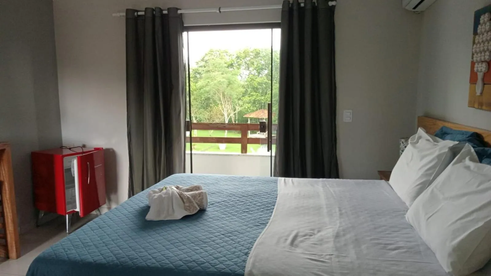 Bed in Pousada Casa do Bosque