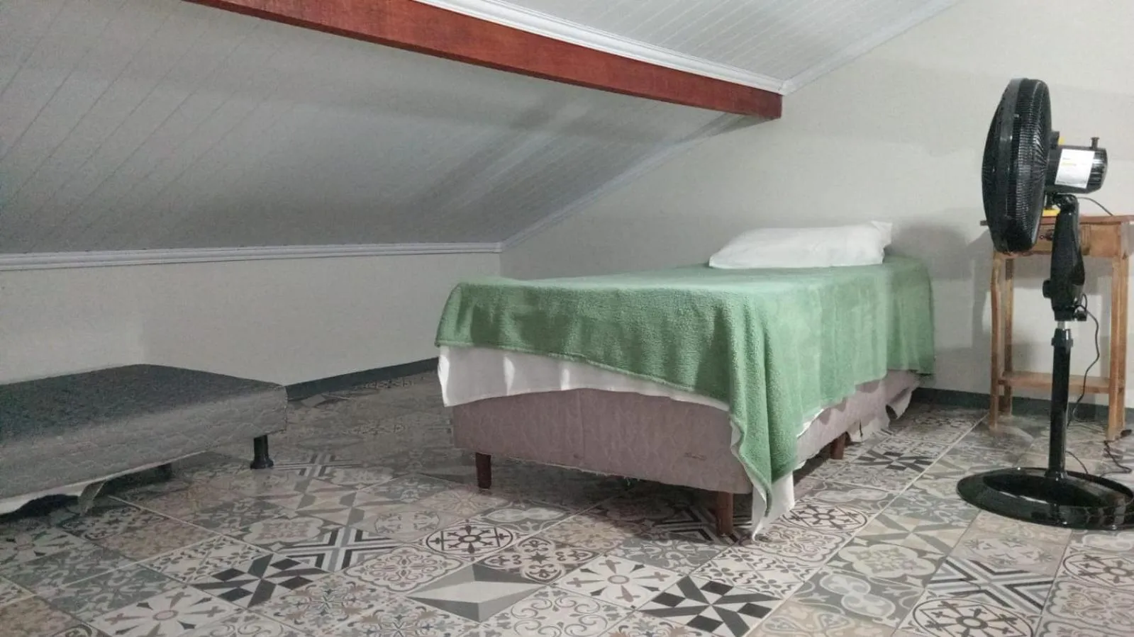 Bed in Pousada Casa do Bosque