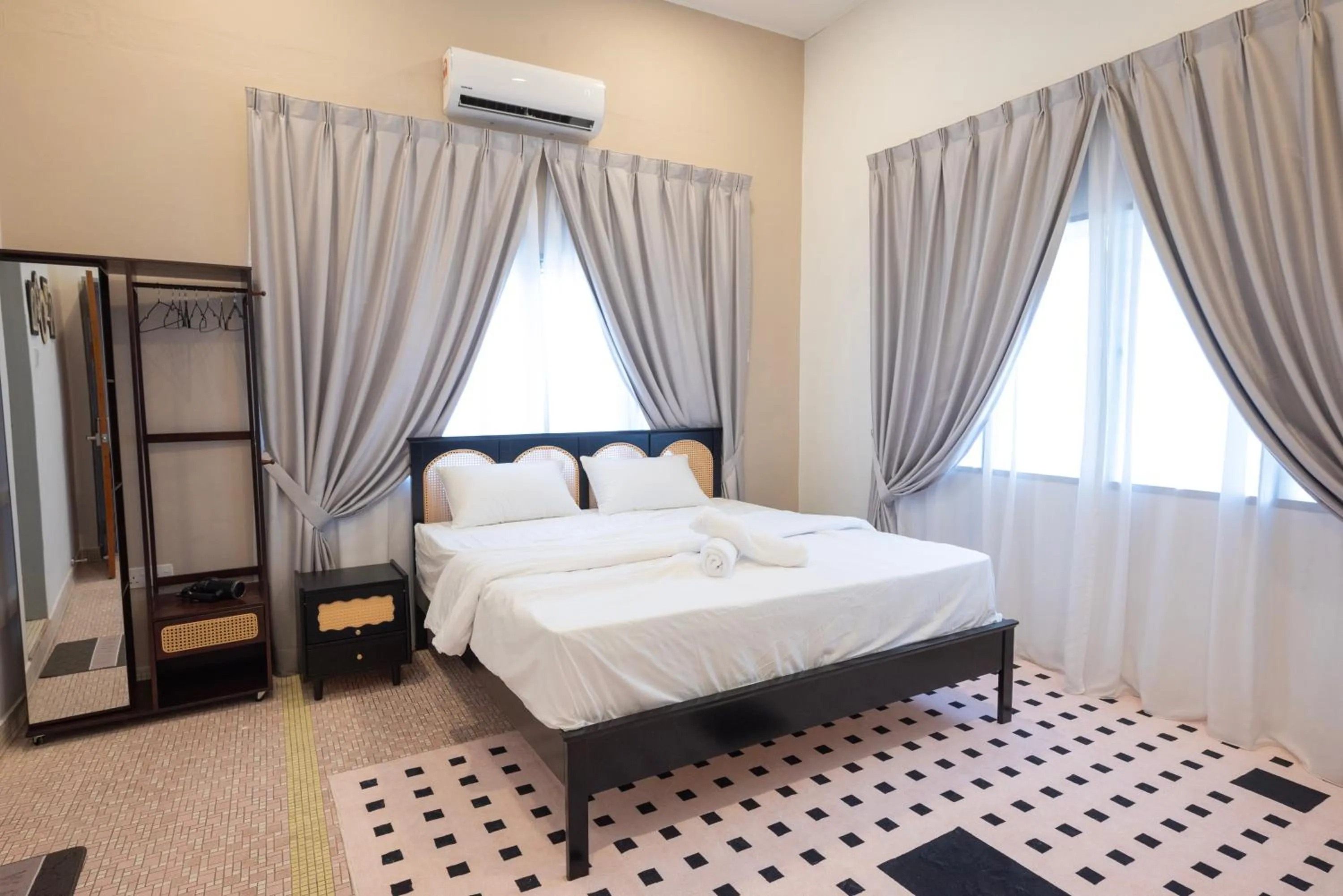 Bed in Big Mansion at Kuantan by Iconique Espace