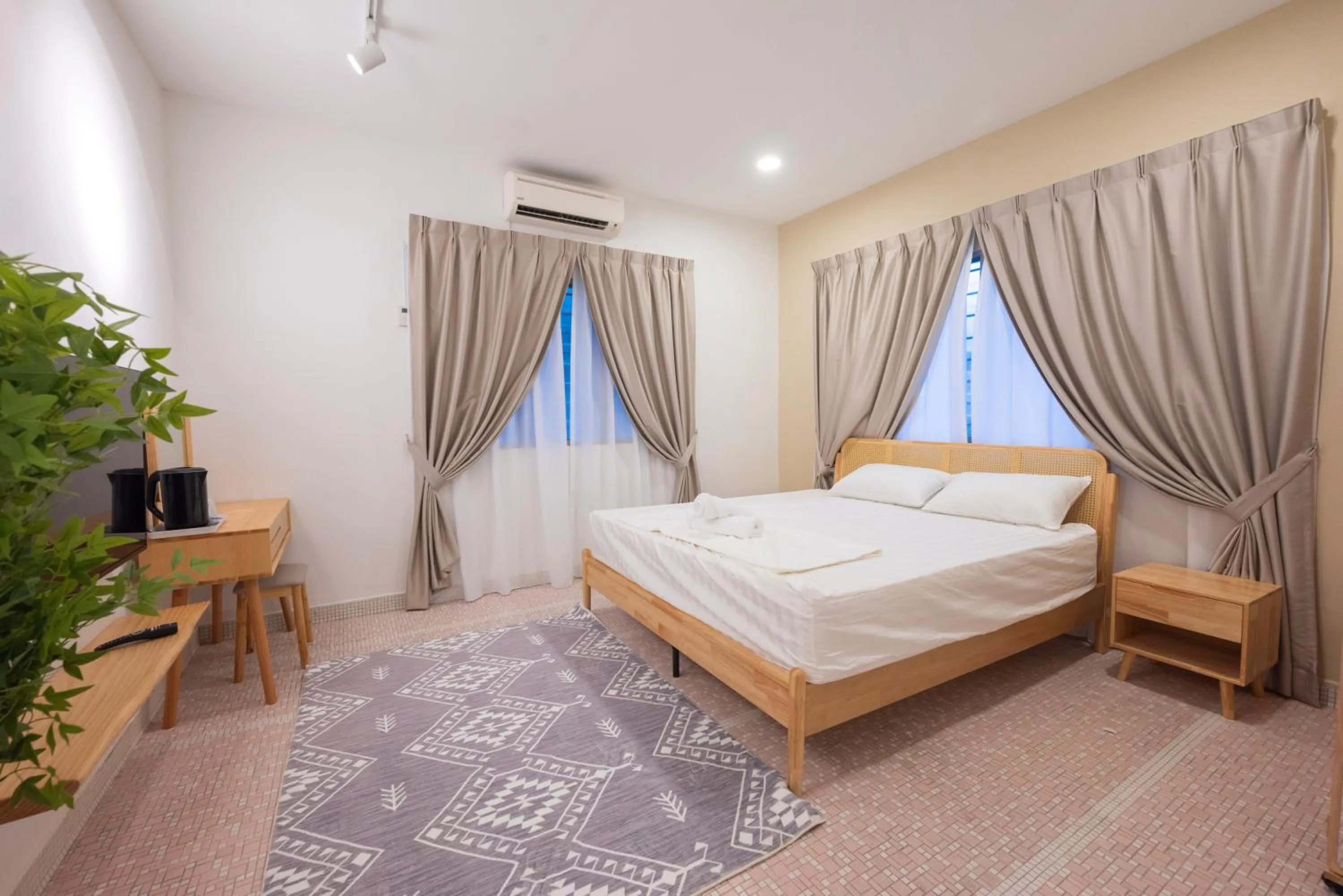 Bed in Big Mansion at Kuantan by Iconique Espace