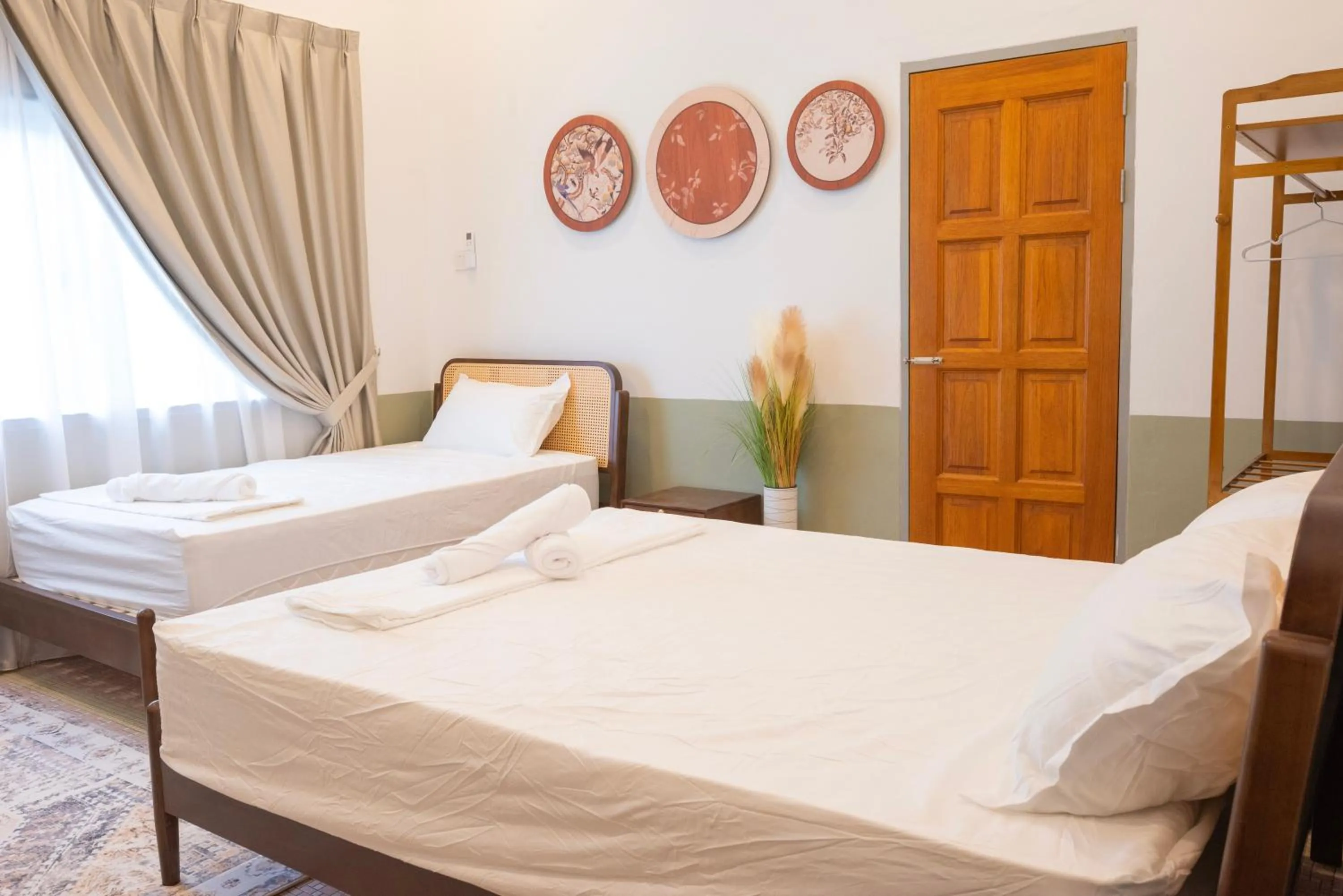 Bed in Big Mansion at Kuantan by Iconique Espace