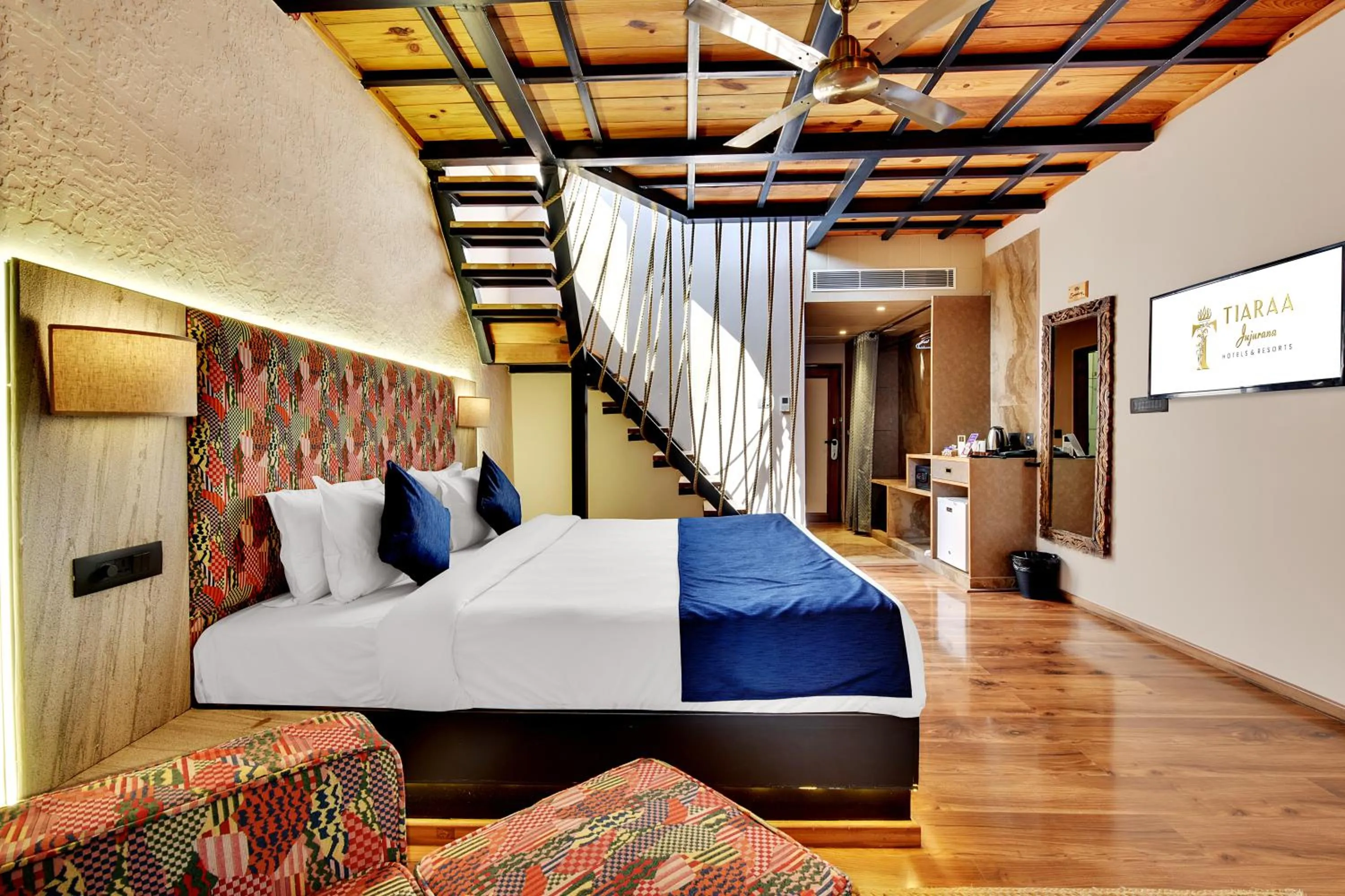 Bed in Tiaraa Jujurana Resort & Spa