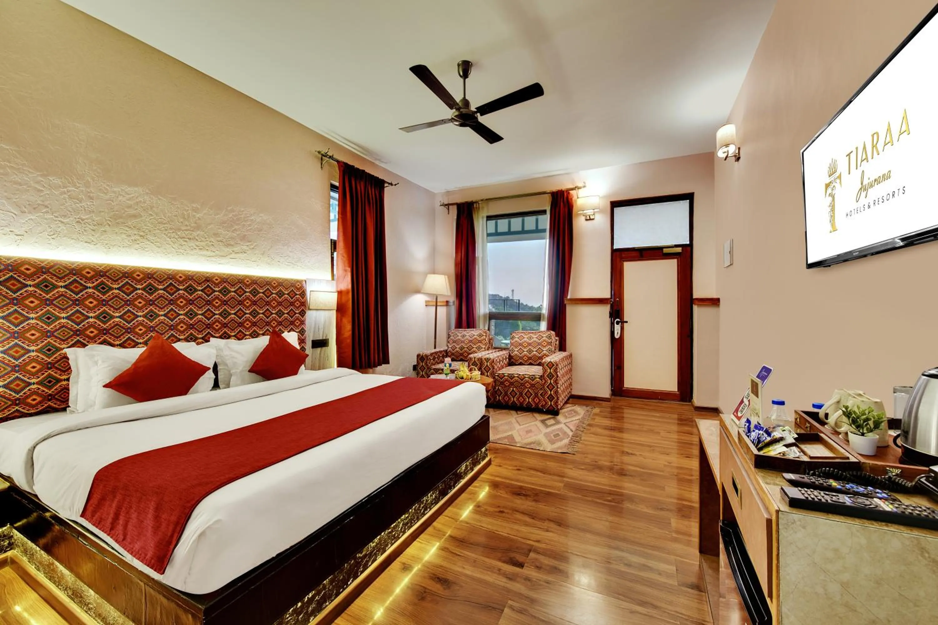 Bed in Tiaraa Jujurana Resort & Spa