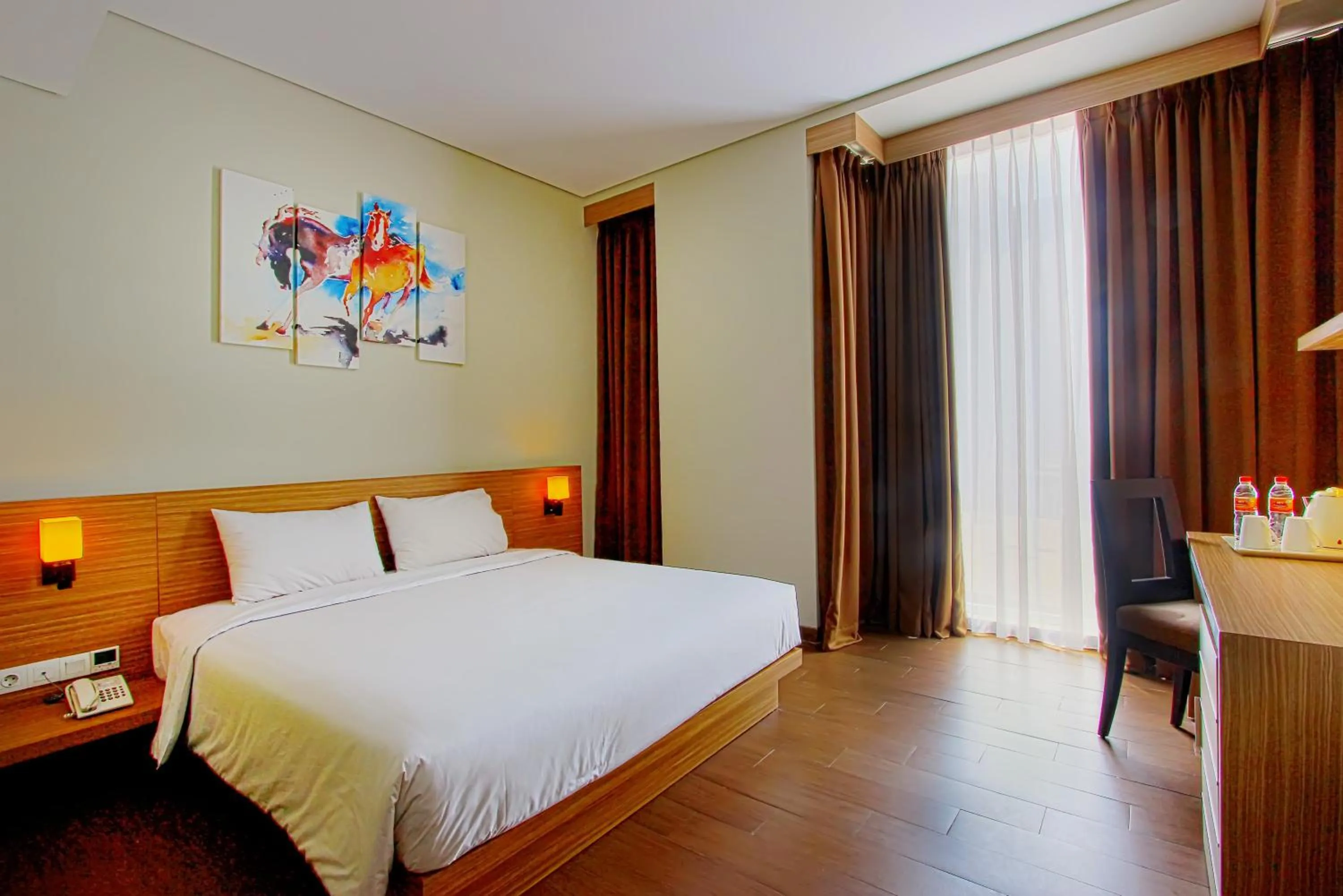 Bedroom in De'Rain Hotel Bandung