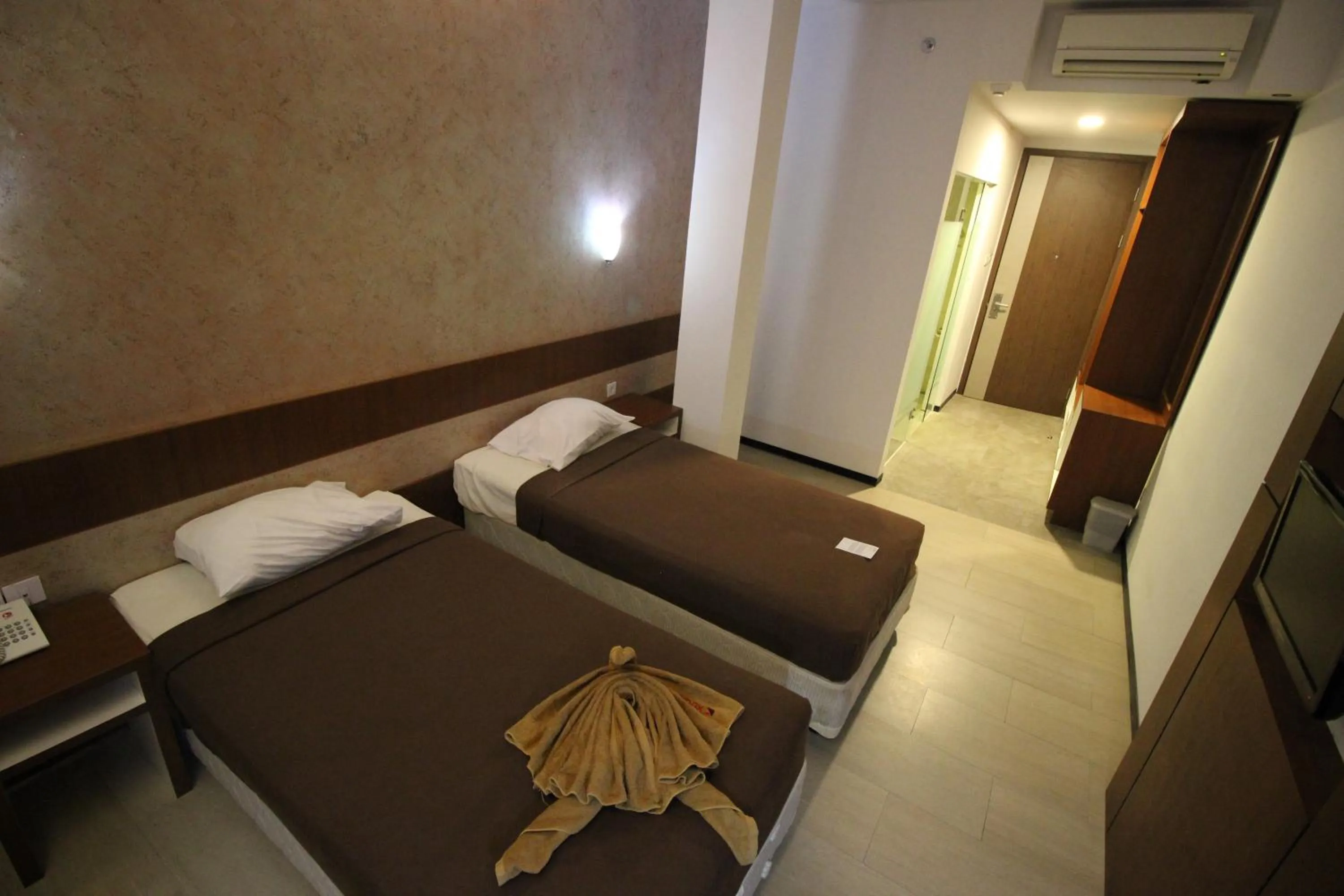 Bed in Xtra Hotel Bengkulu