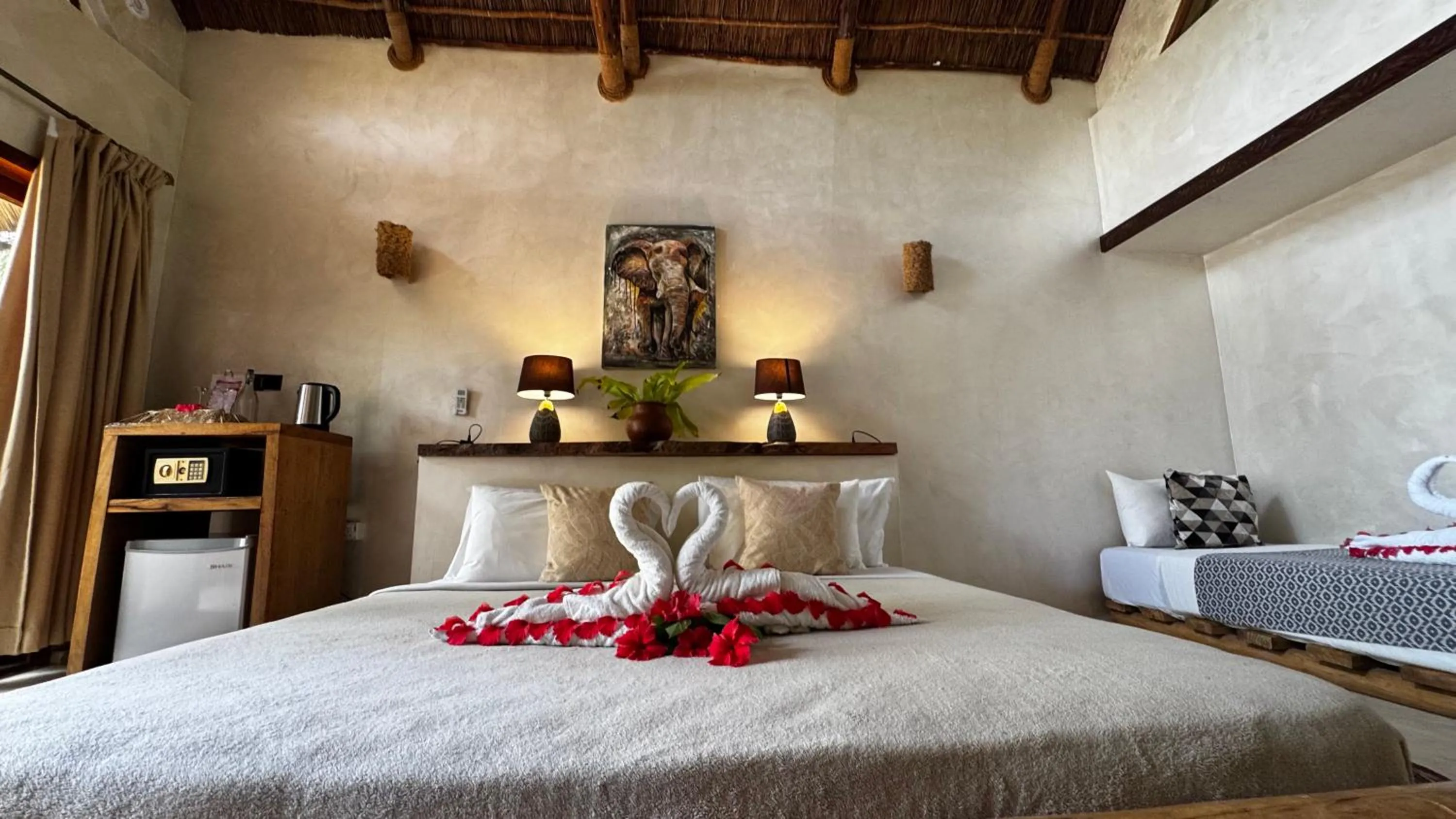 Bed in The Nest Tropical Oasis Resort