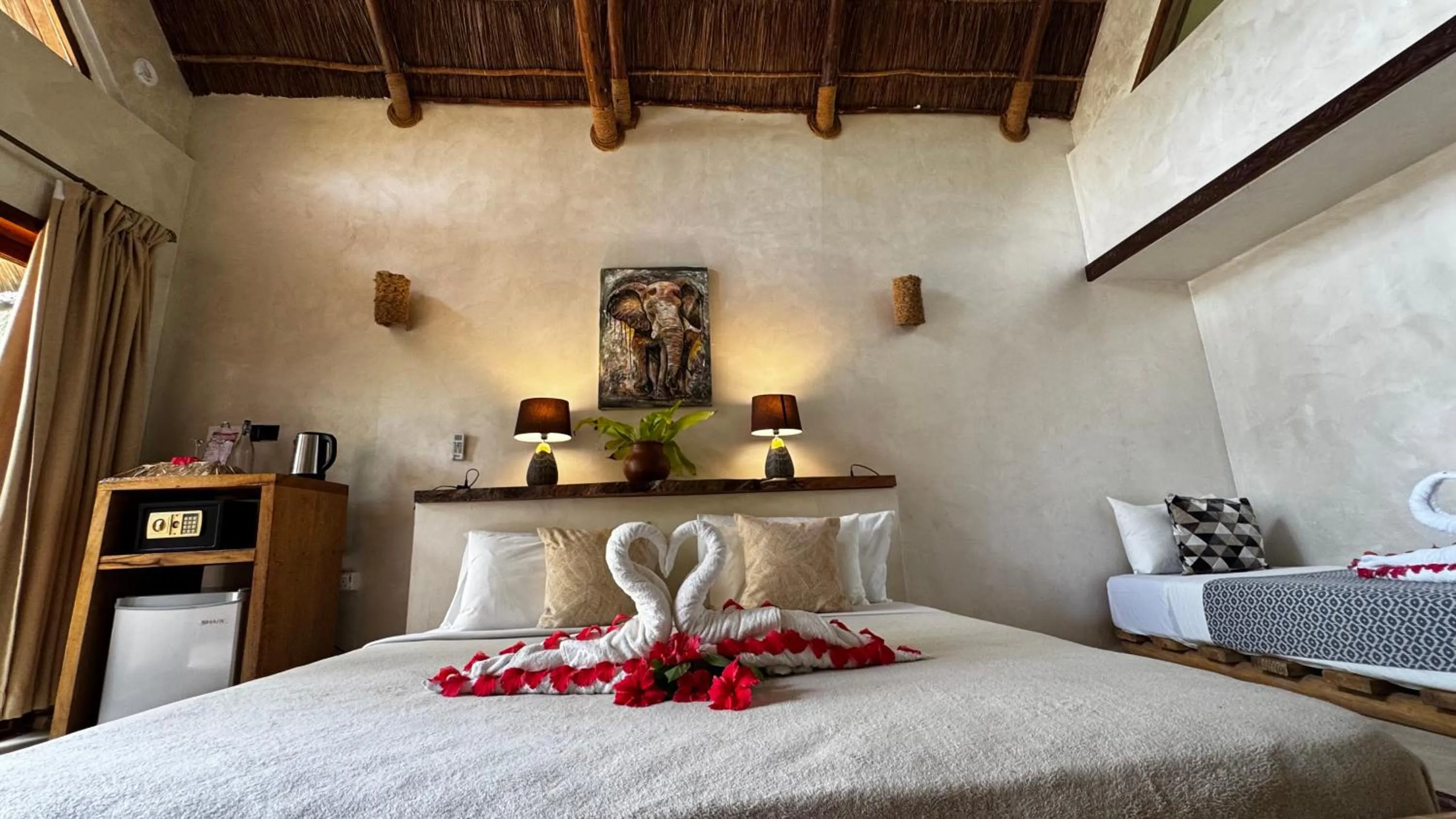 Bed in The Nest Tropical Oasis Resort