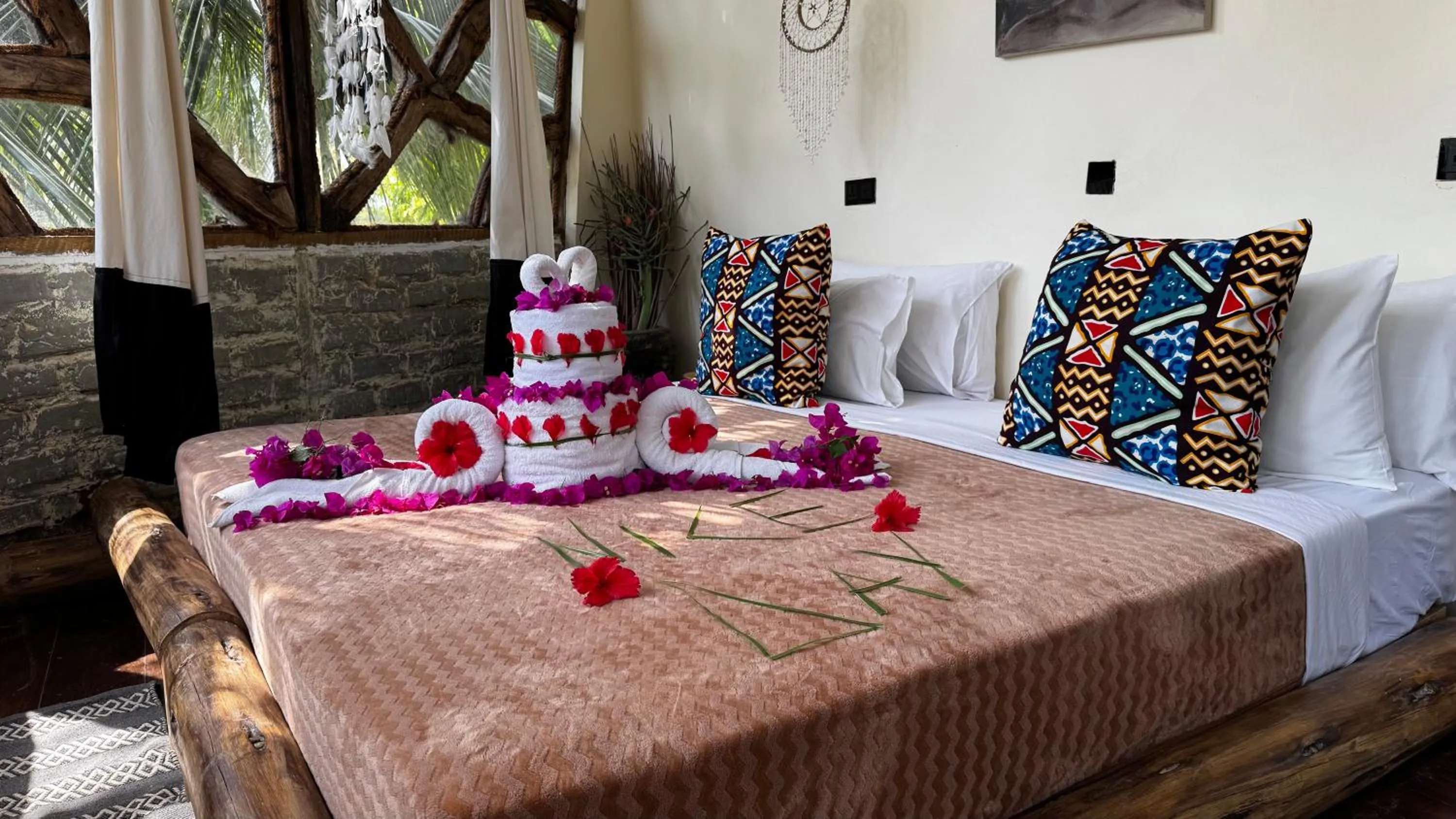 Bed in The Nest Tropical Oasis Resort