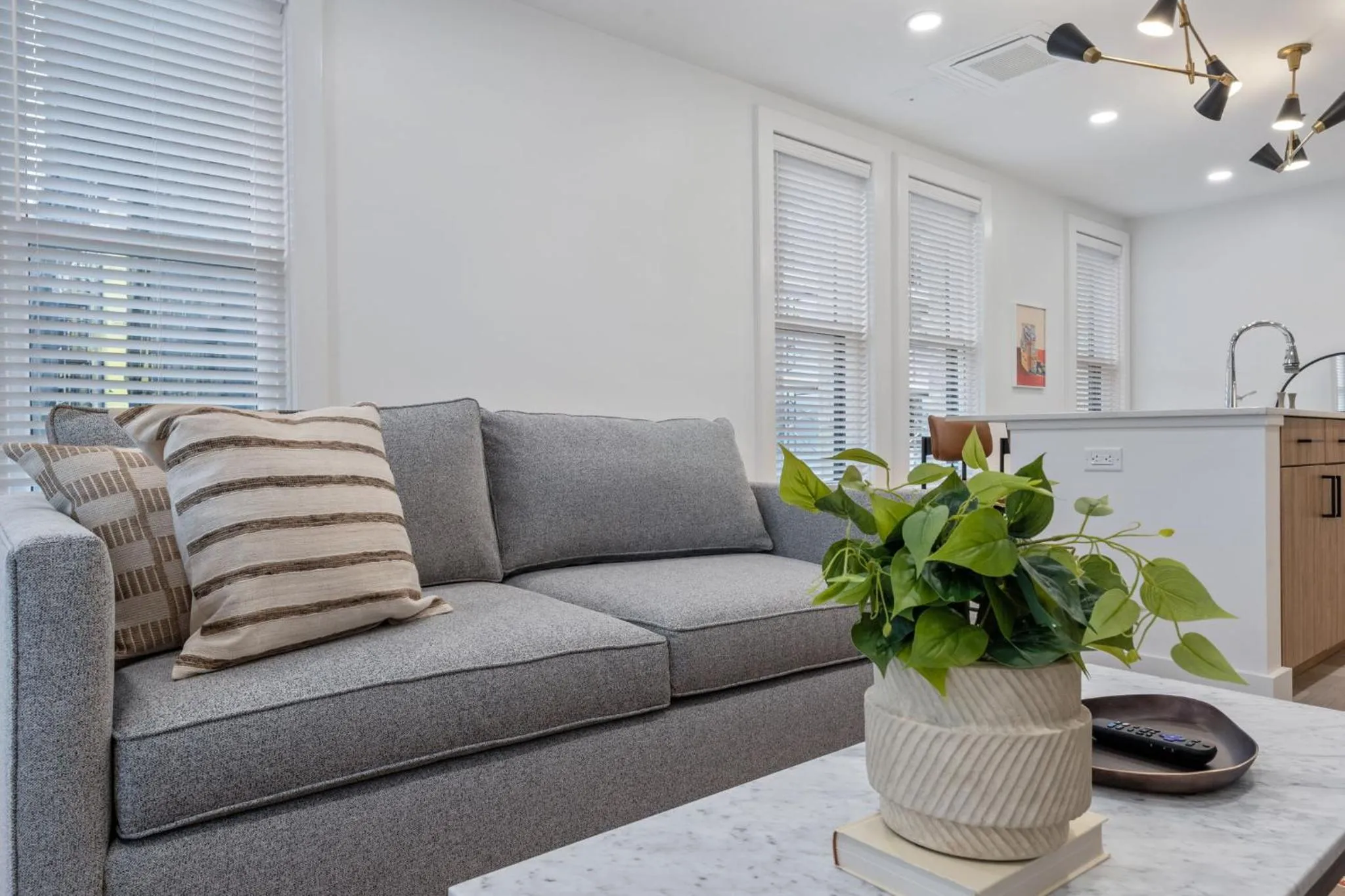 Living room in The Continental, powered by Placemakr - Downtown - Market Square