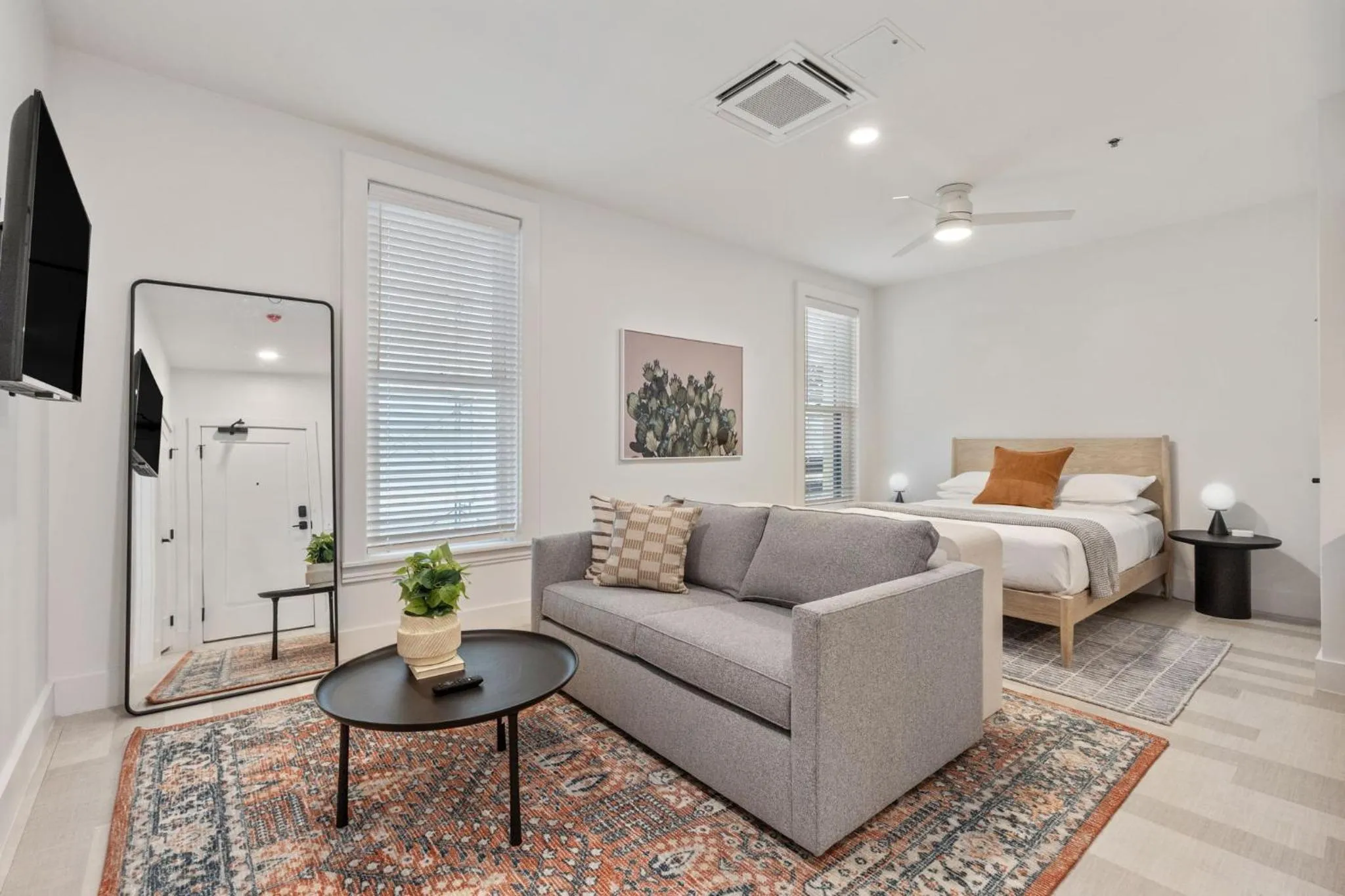 Living room, Bed in The Continental, powered by Placemakr - Downtown - Market Square