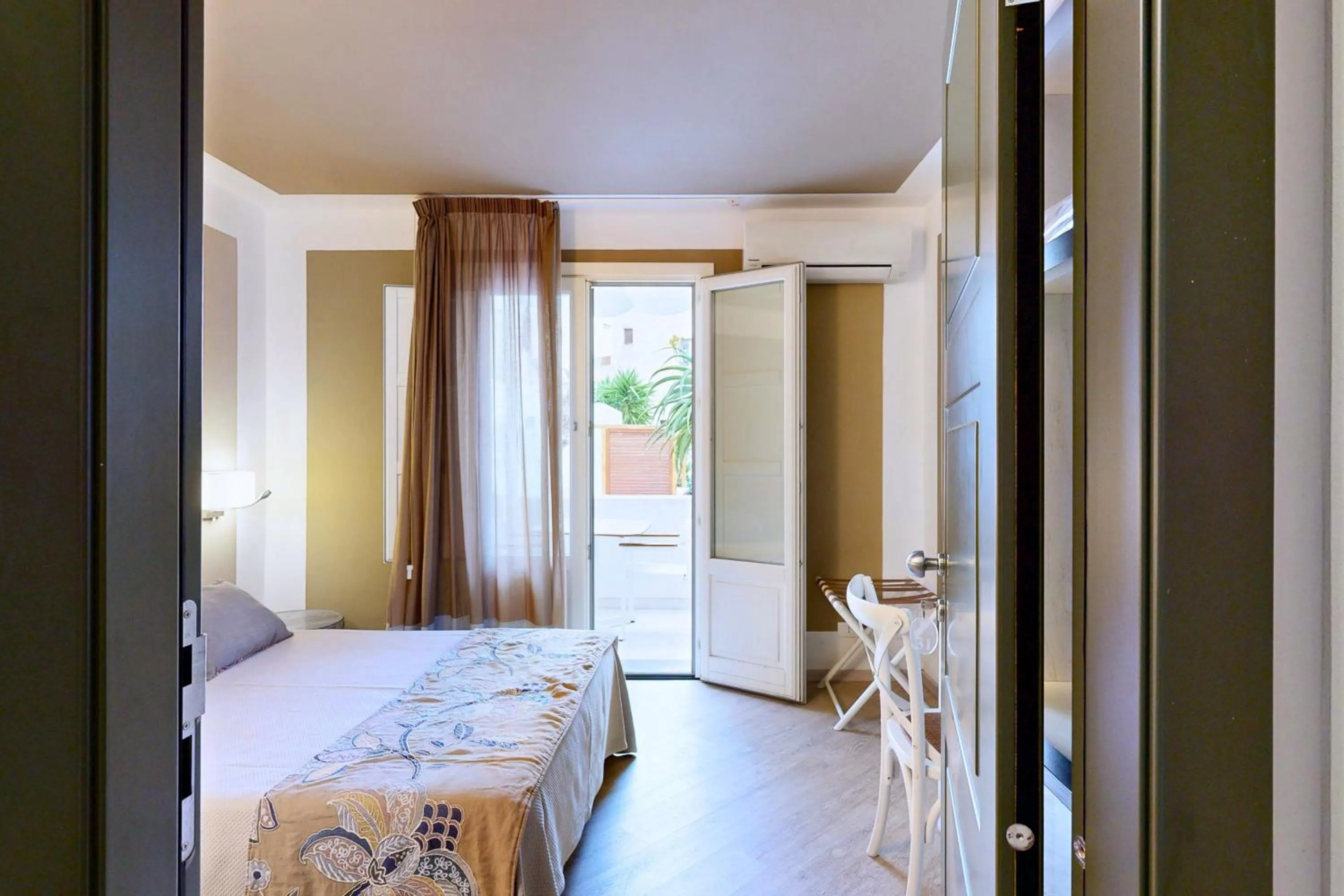 Balcony/Terrace, Bed in Aegusa Hotel