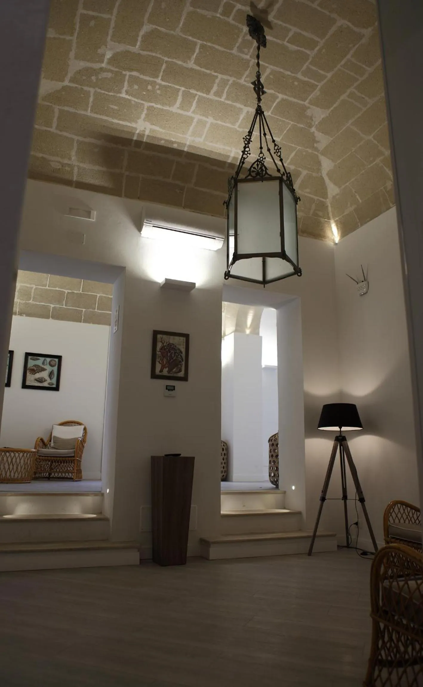 Communal lounge/ TV room, Bed in Aegusa Hotel