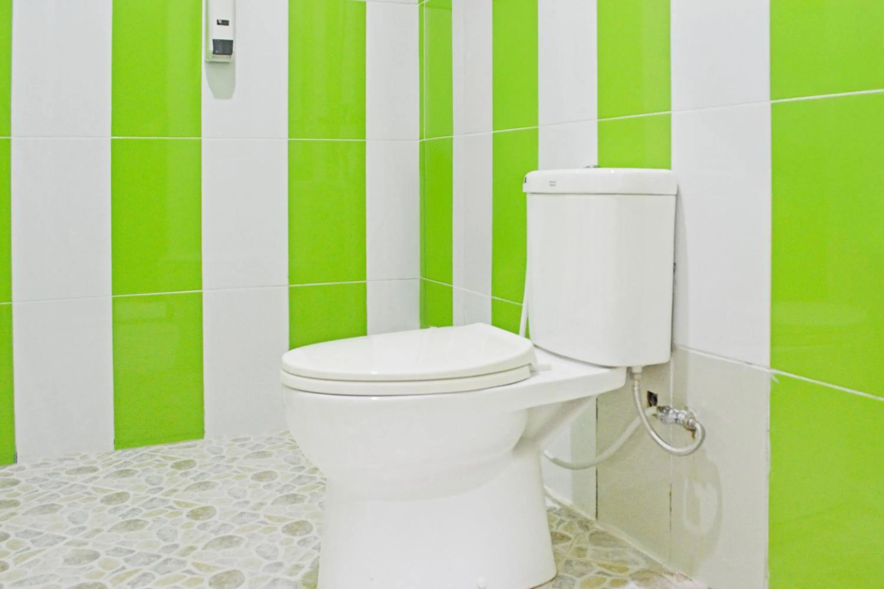 Bathroom in Collection O Balikpapan Near Balikpapan Super Block Formerly City Inn Hotel