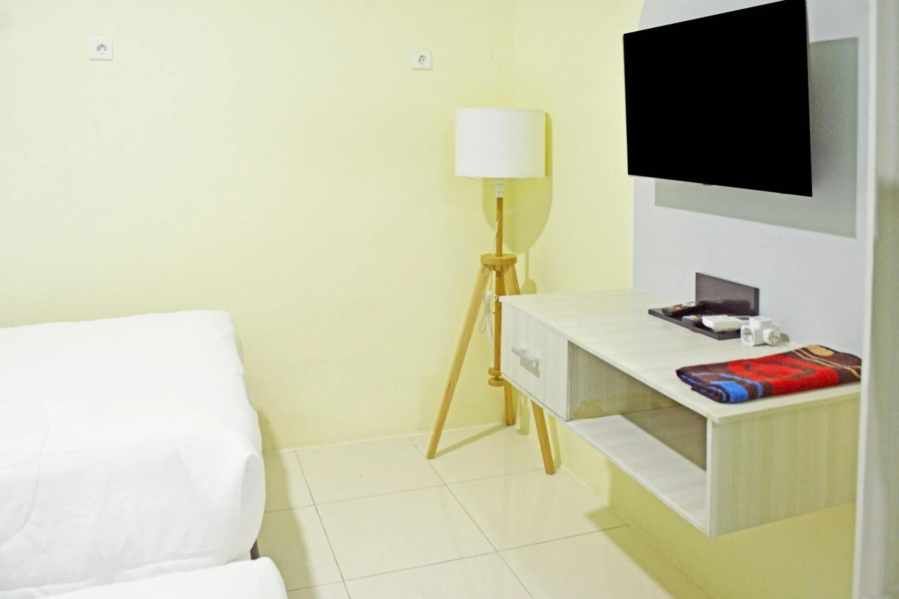 Bedroom in Collection O Balikpapan Near Balikpapan Super Block Formerly City Inn Hotel