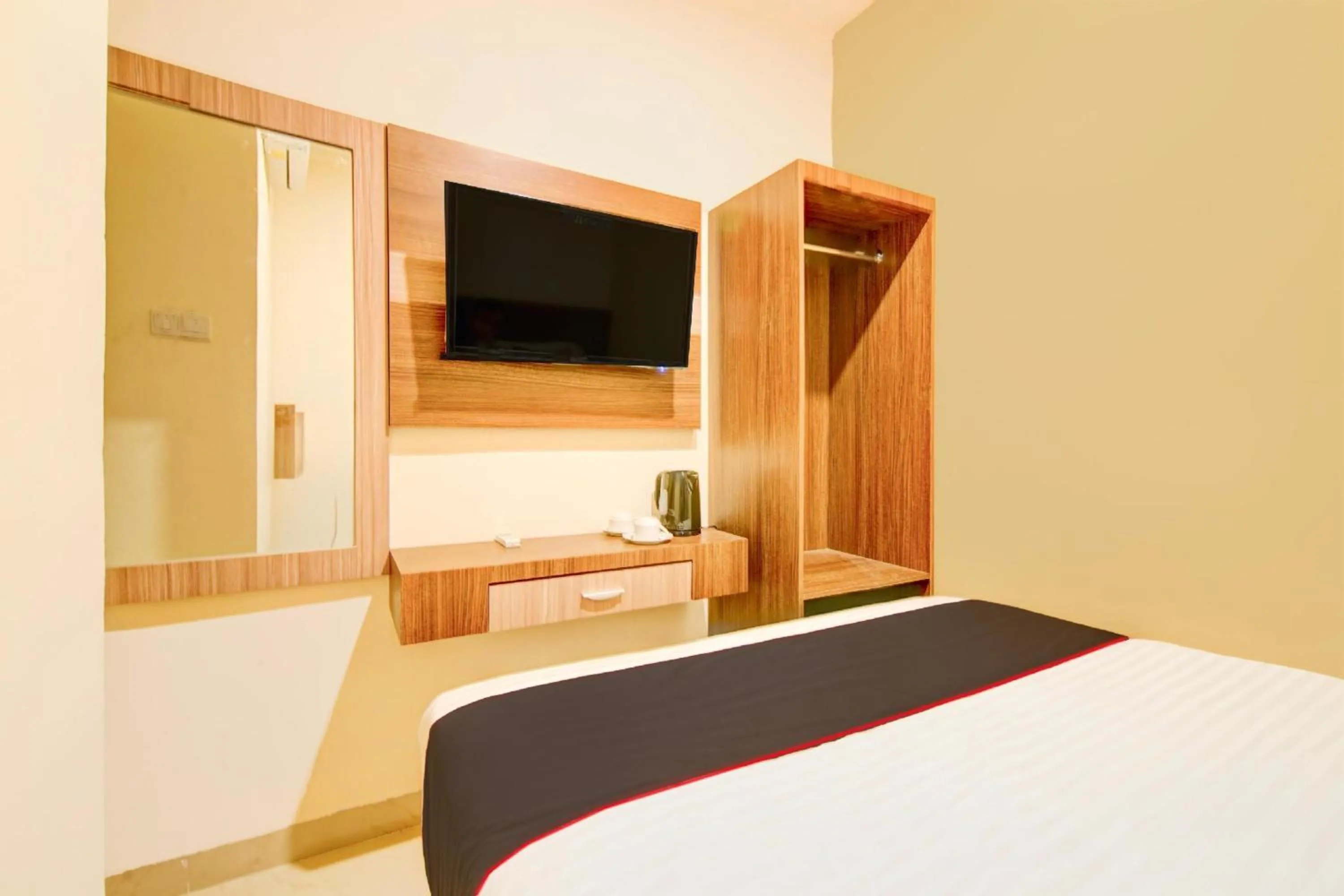 Photo of the whole room, Bed in Capital O Pusat Kota Pekanbaru Near Mall Living World Formerly Radja Homestay