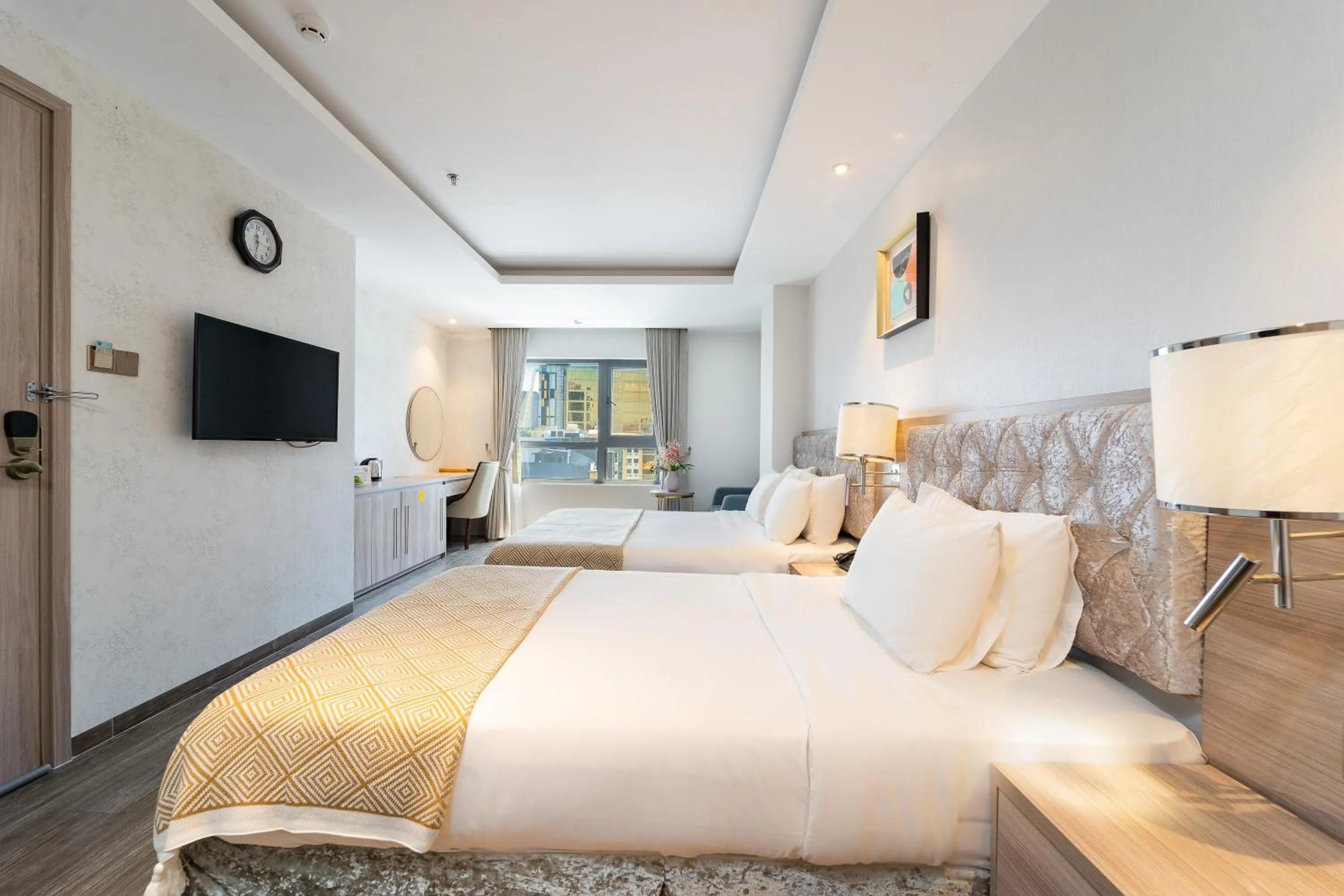 Bed in Nicecy Hotel Suites & Spa