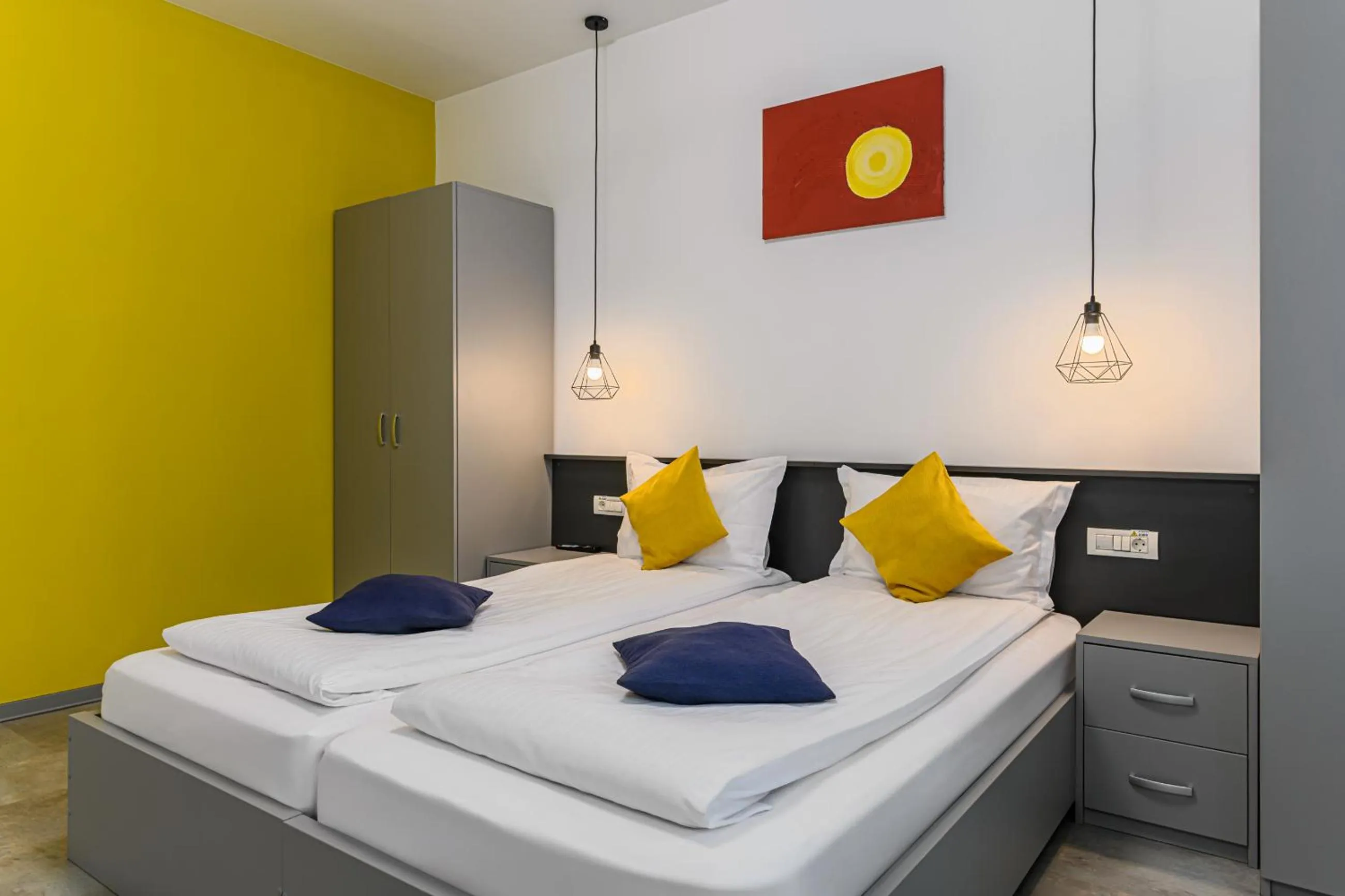 Bed in Johann Strauss Hotel