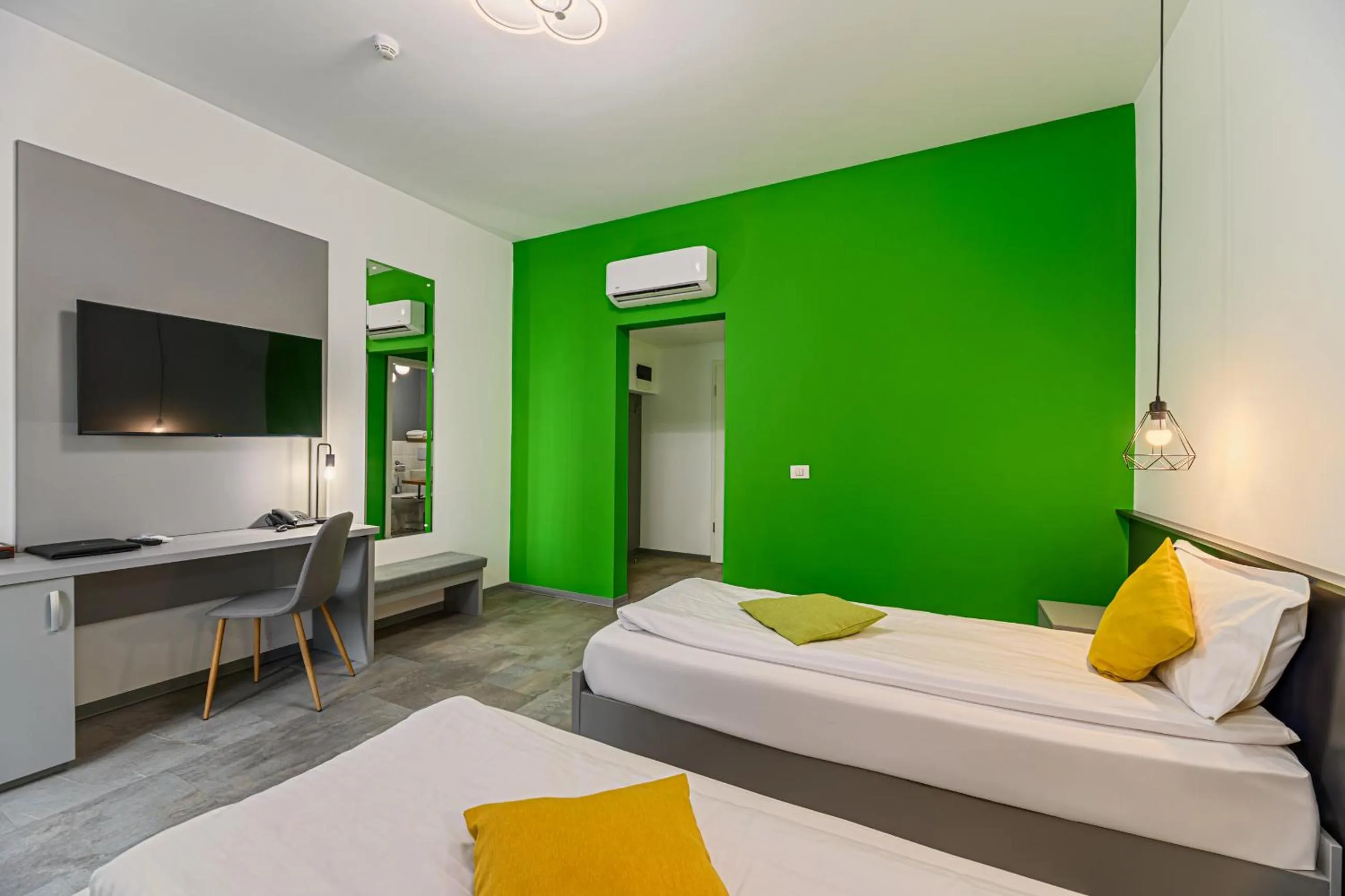 Bed in Johann Strauss Hotel