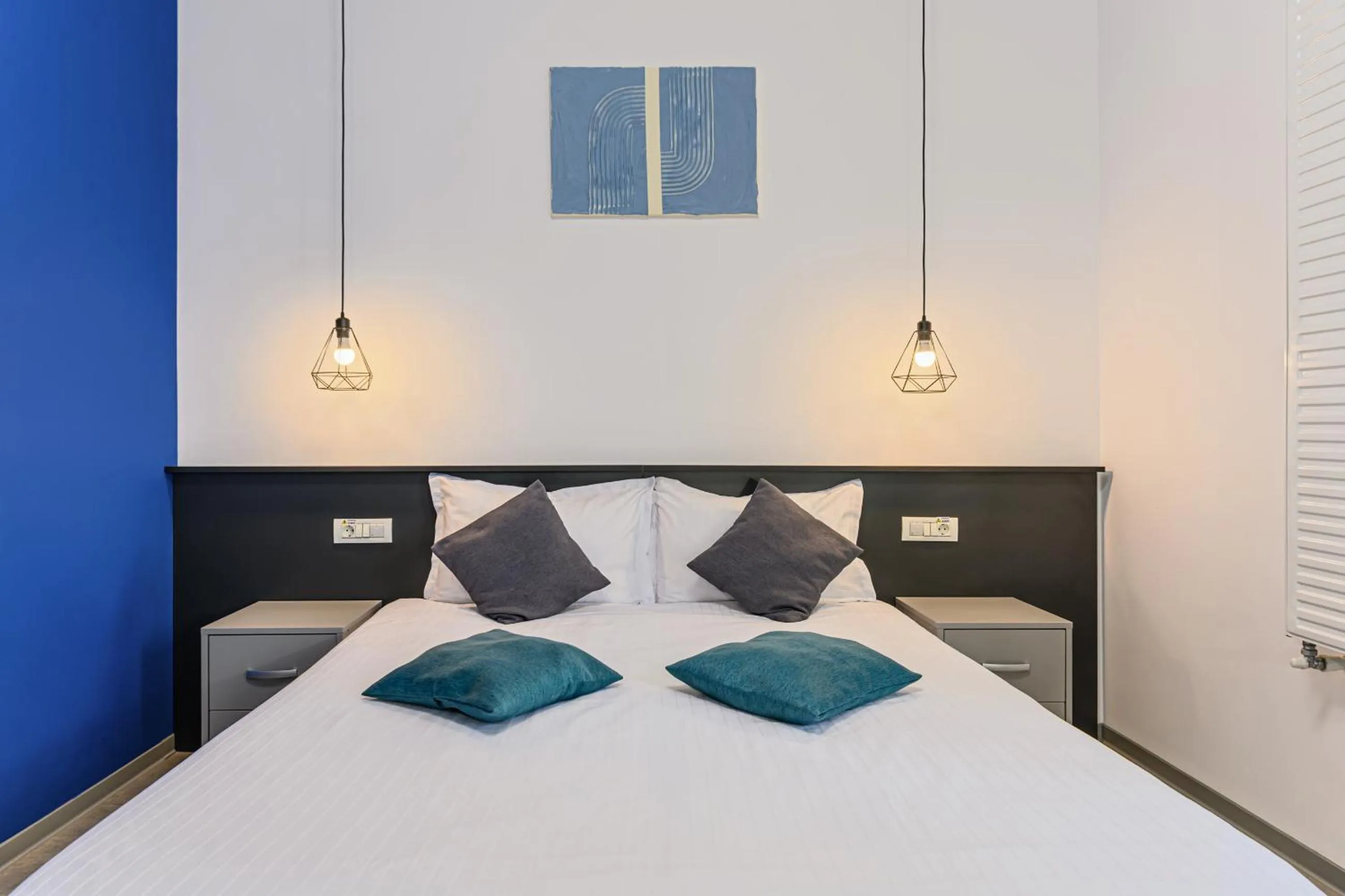 Bed in Johann Strauss Hotel