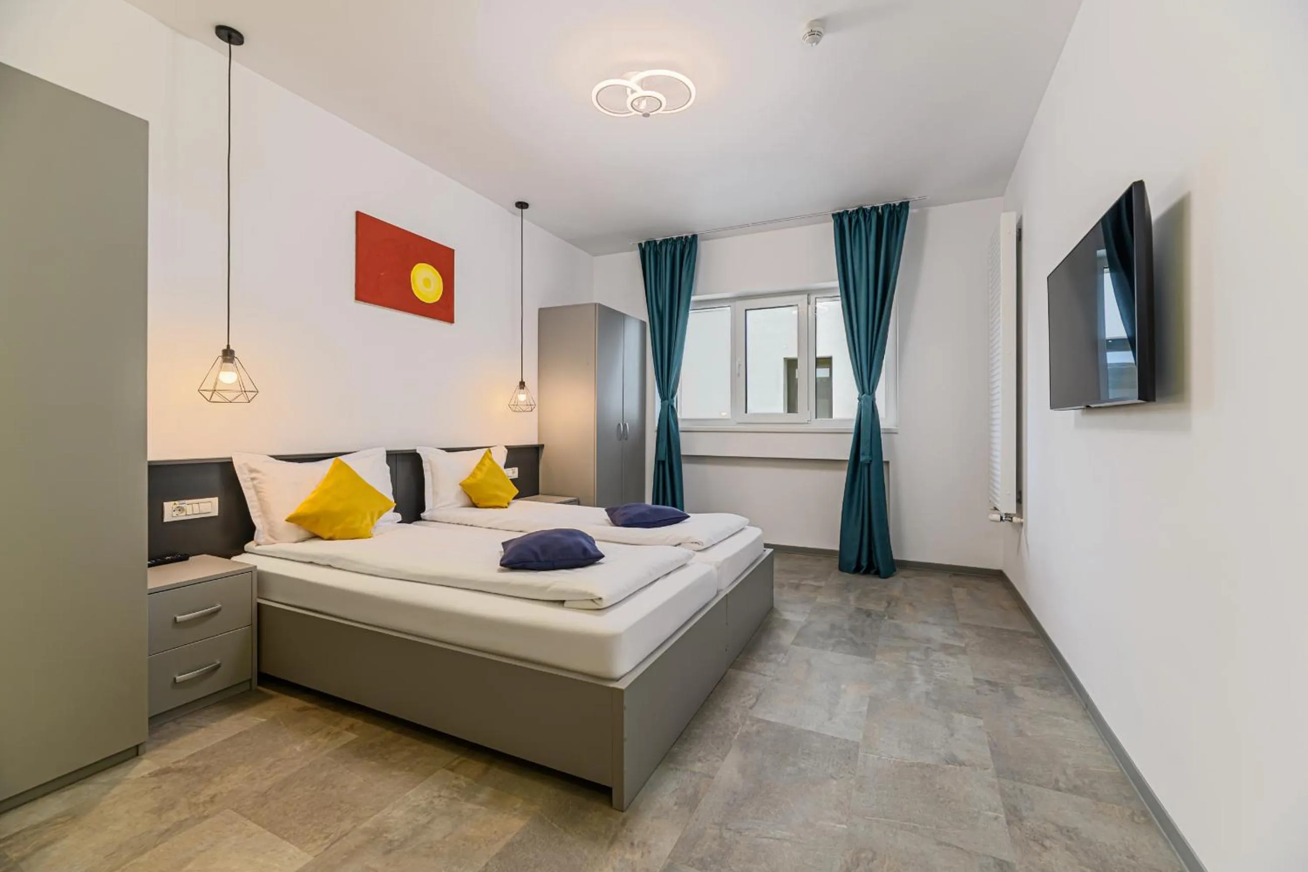 Bed in Johann Strauss Hotel