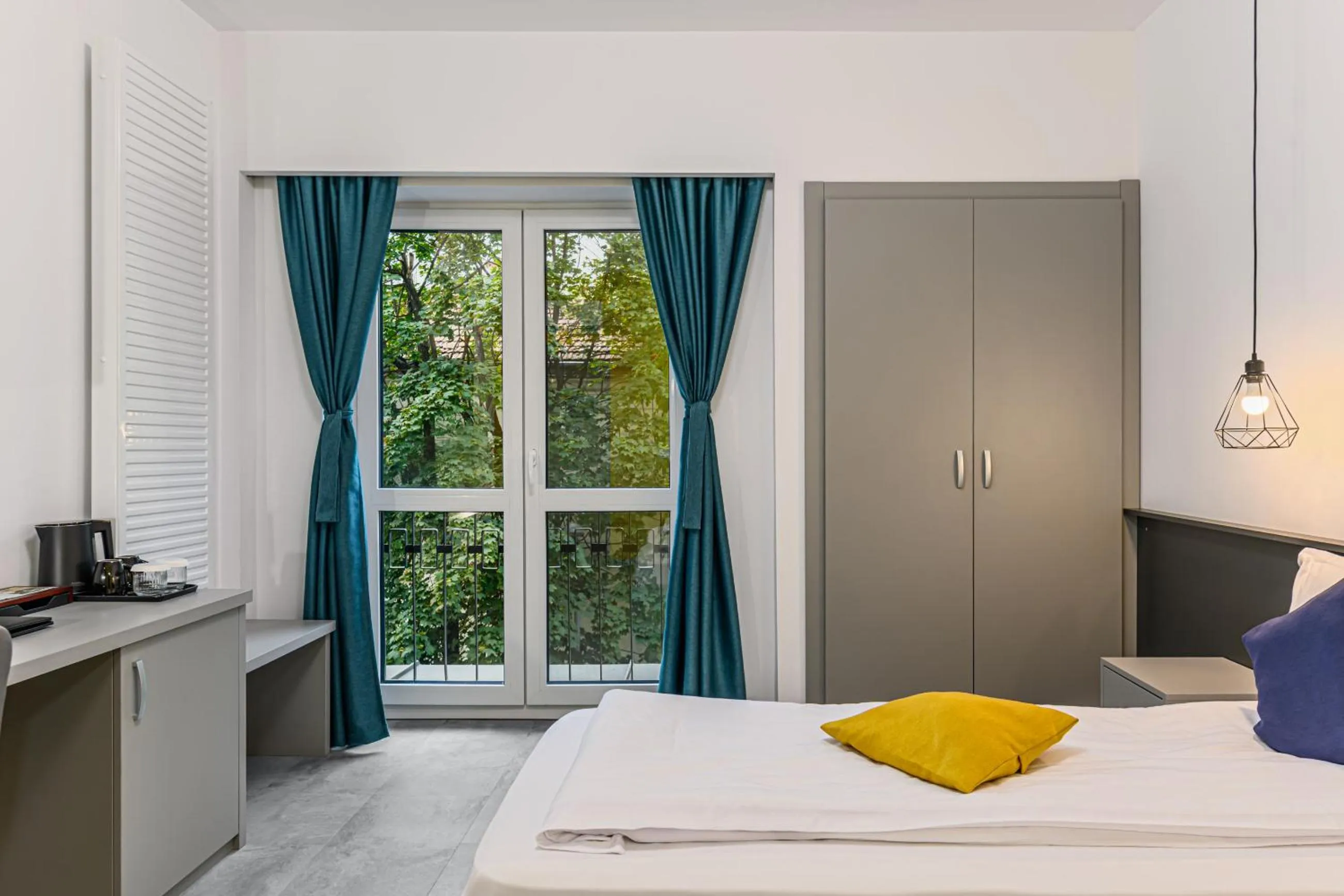 Bed in Johann Strauss Hotel