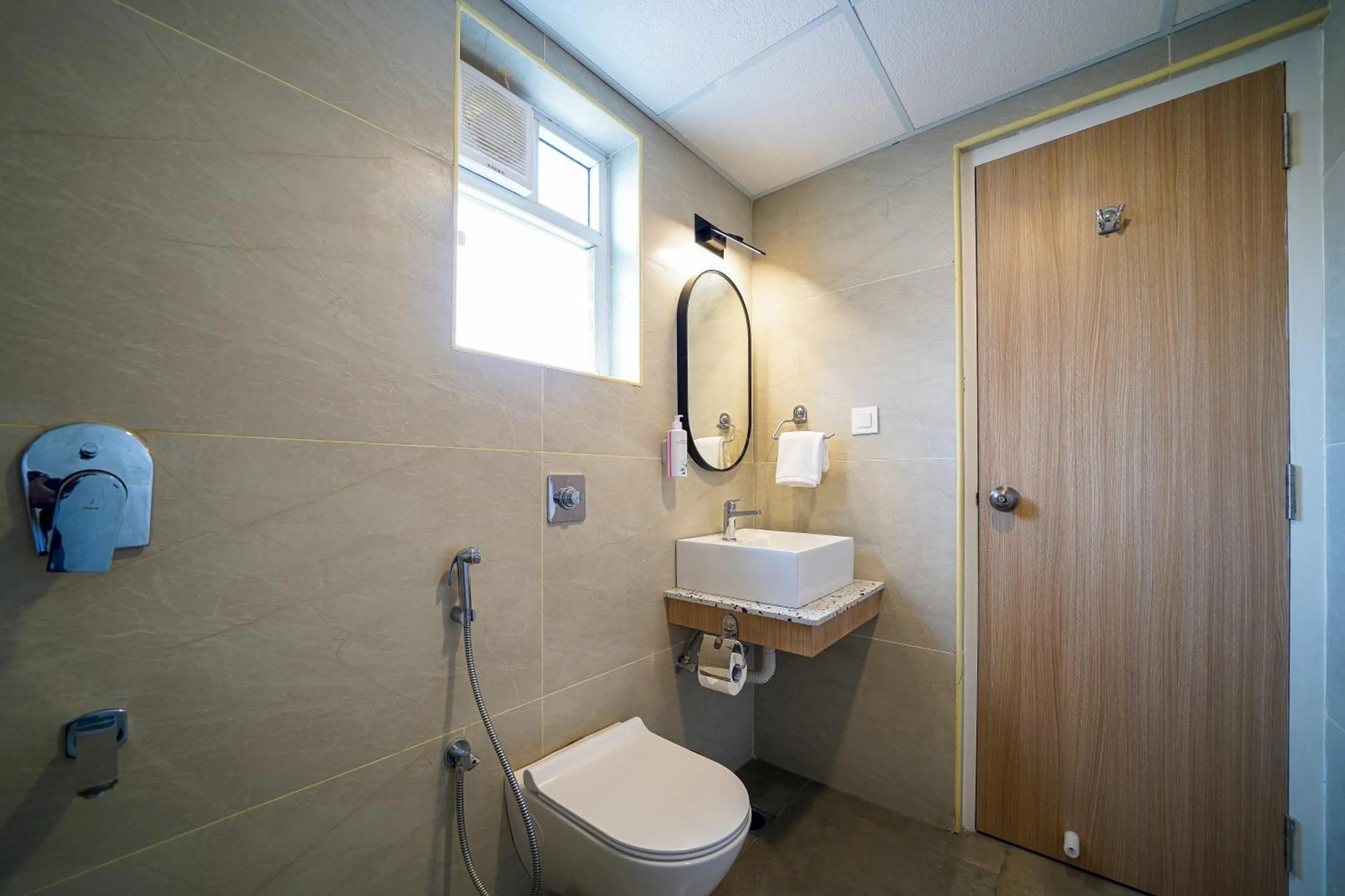 Bathroom in Olive Hotel Hoodi by Embassy Group