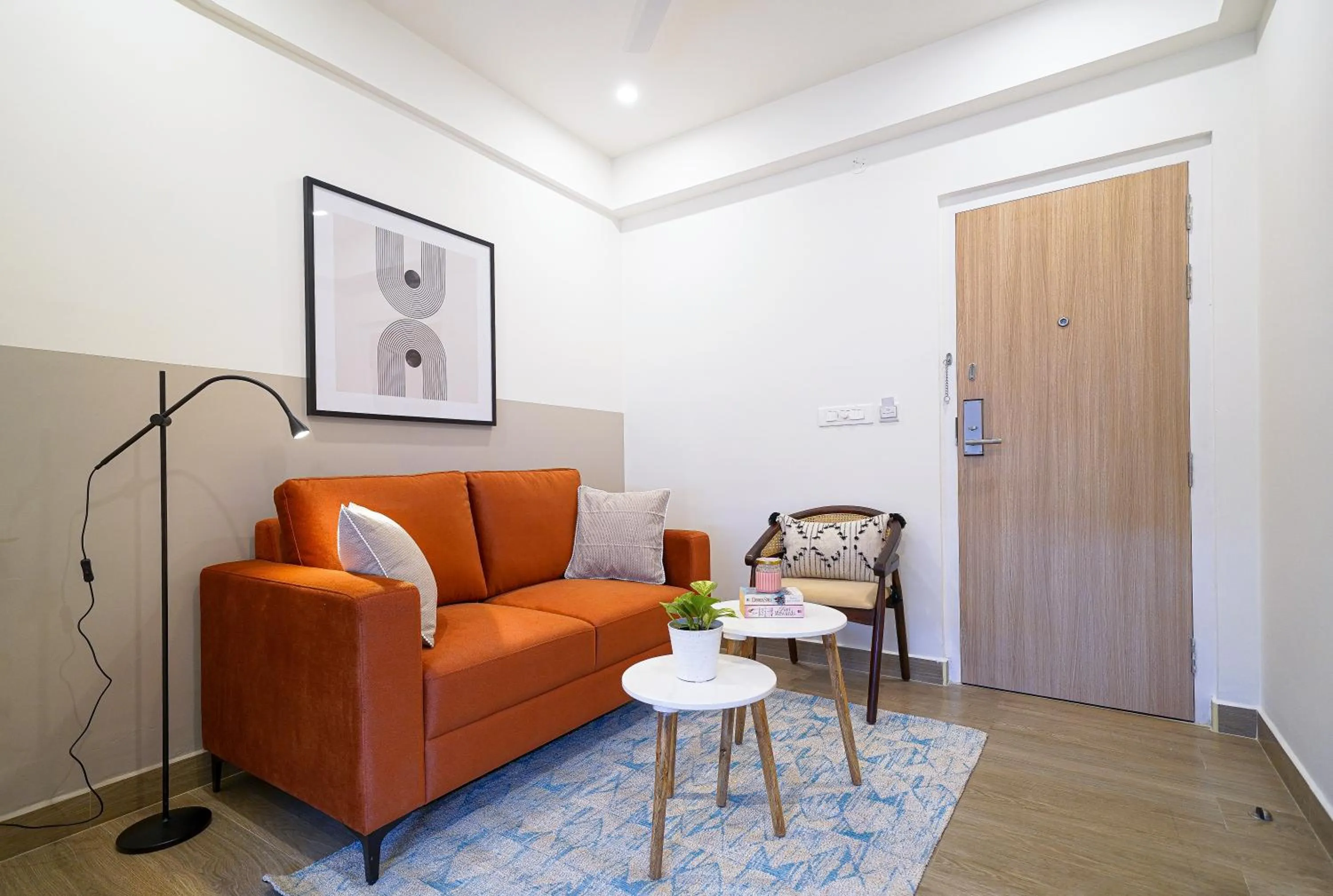 Seating area in Olive Hotel Hoodi by Embassy Group