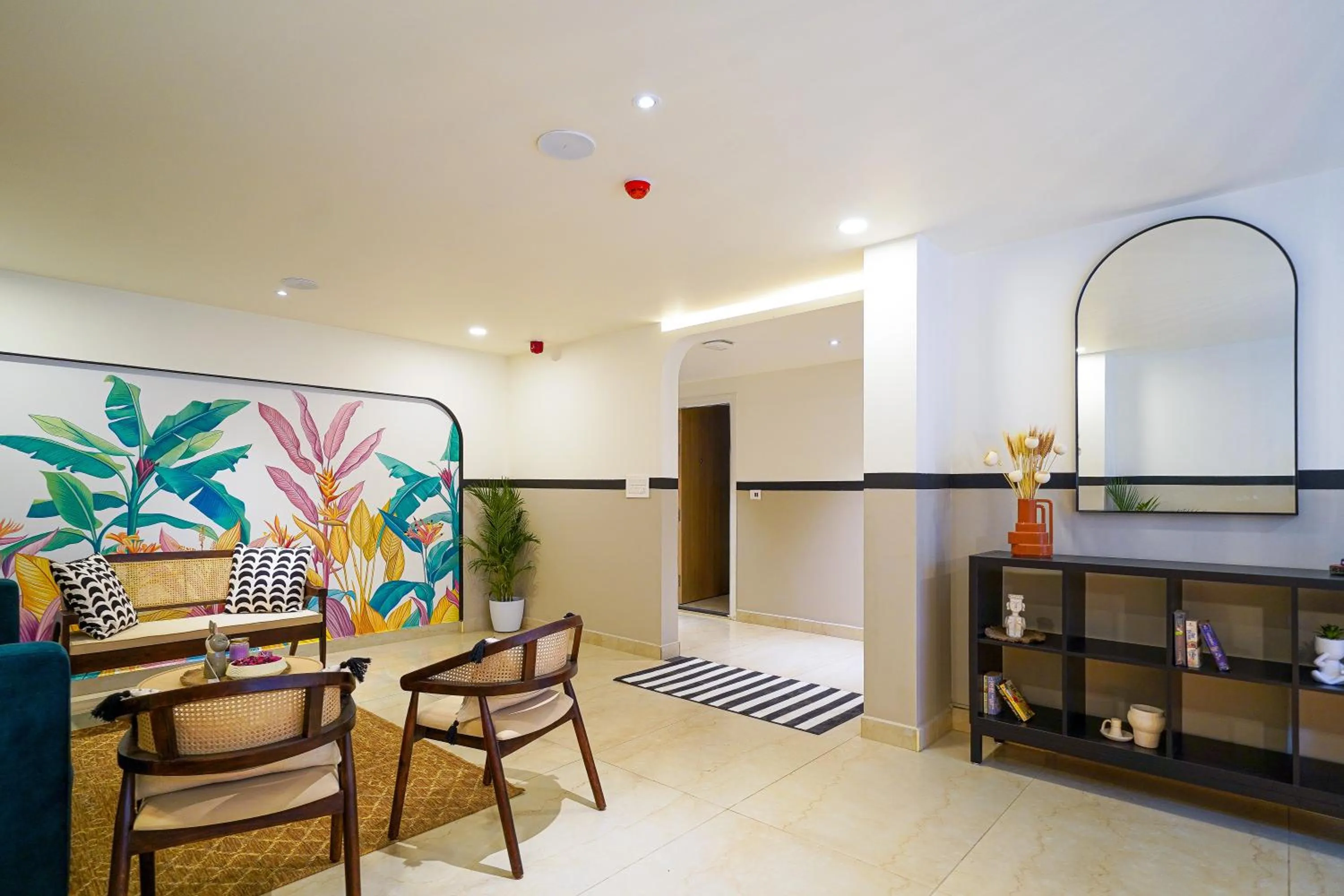 Seating area in Olive Hotel Hoodi by Embassy Group