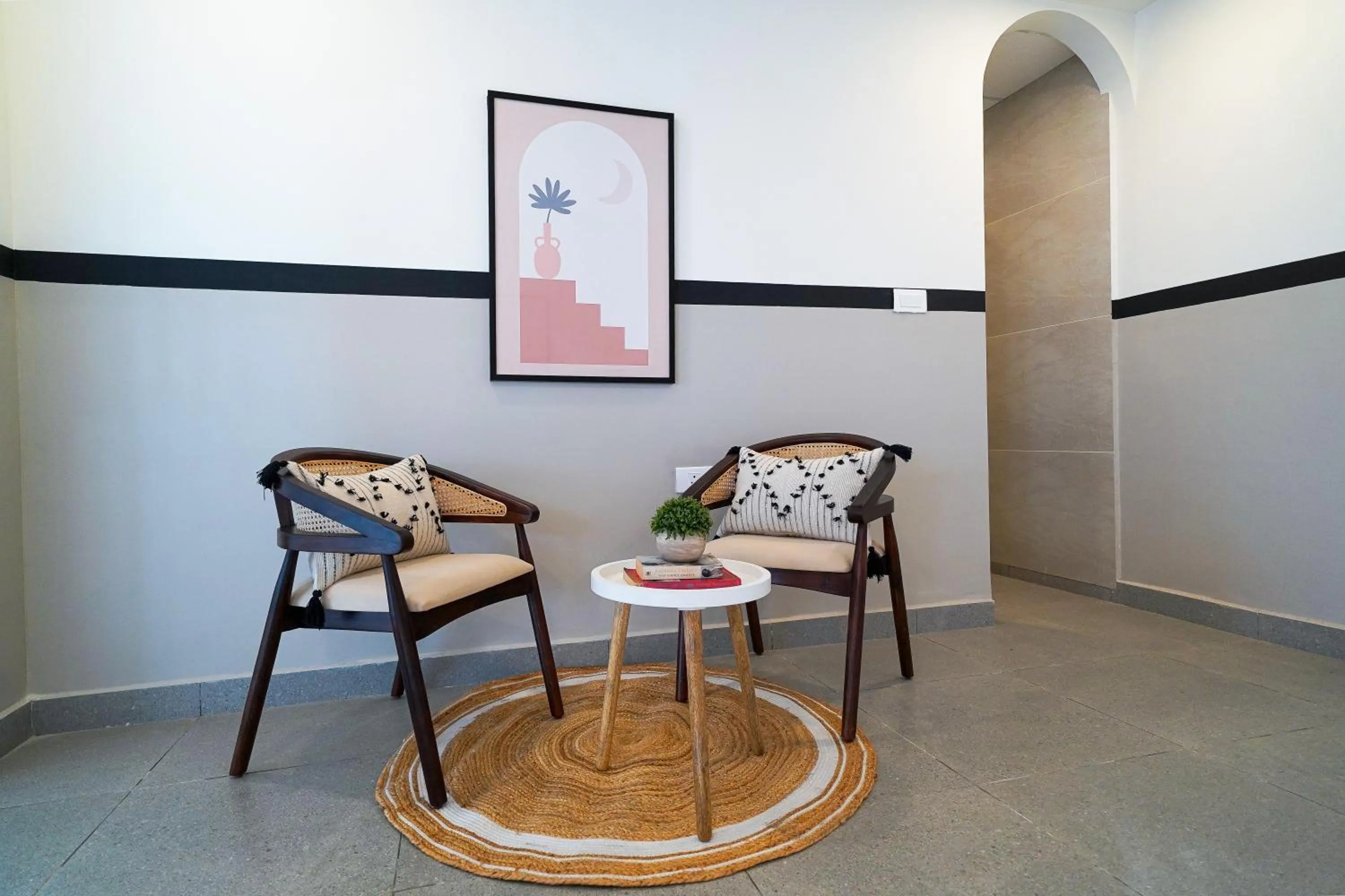 Seating area in Olive Hotel Hoodi by Embassy Group