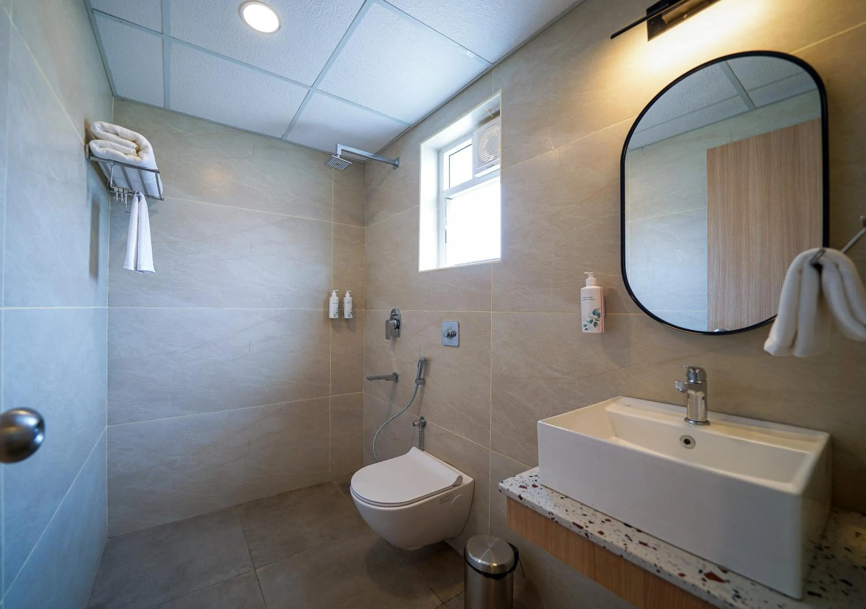 Bath in Olive Hotel Hoodi by Embassy Group