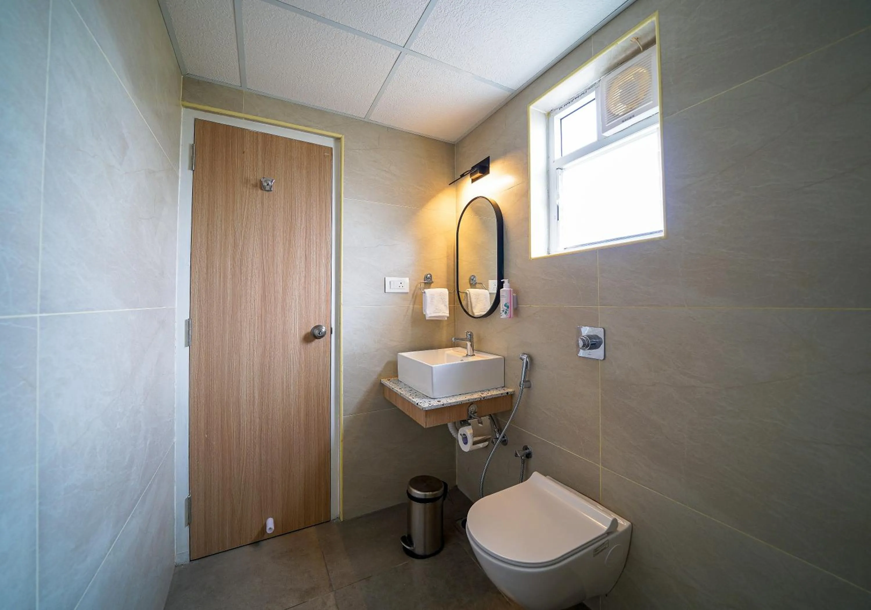 Toilet in Olive Hotel Hoodi by Embassy Group