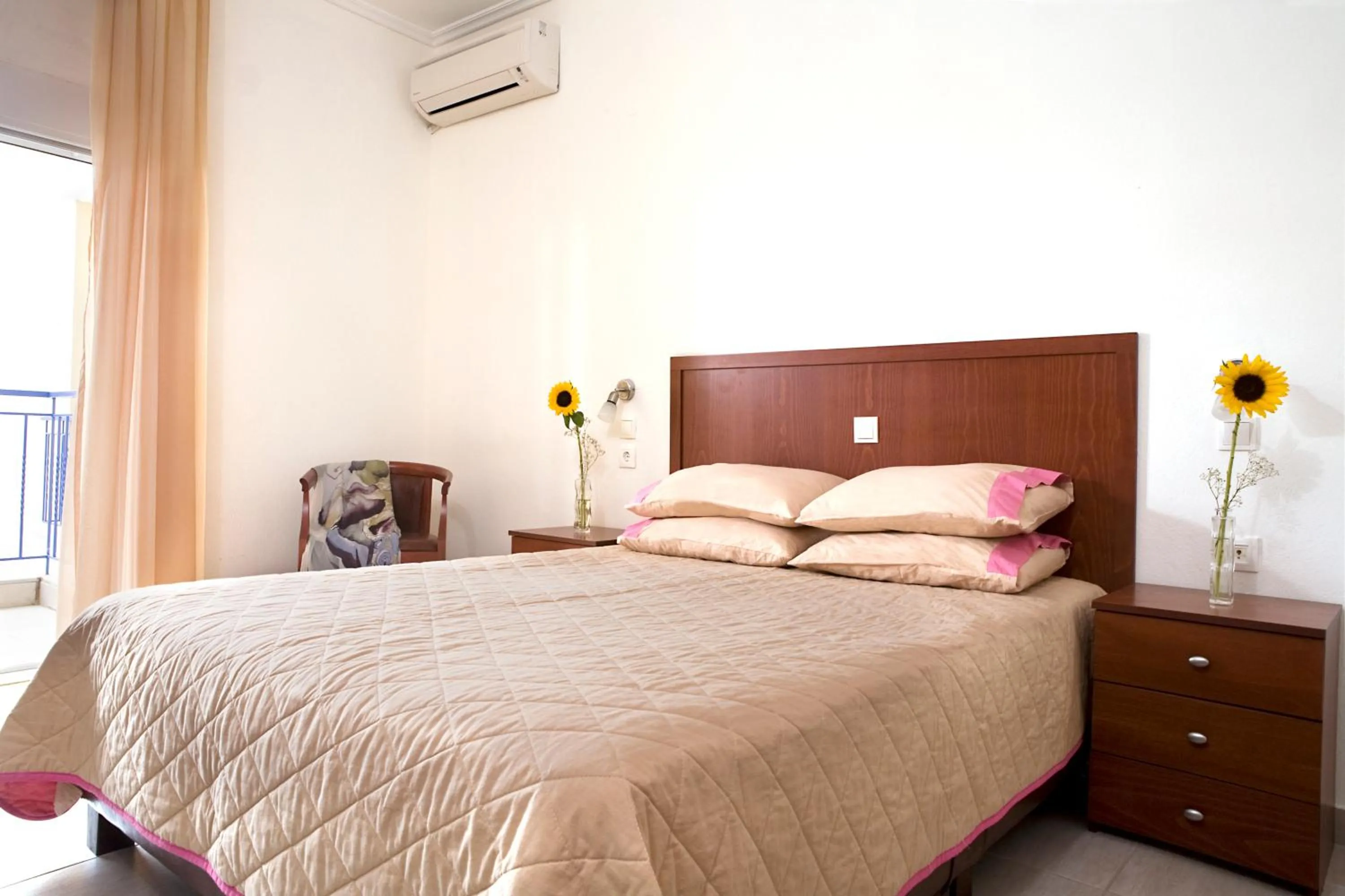 Bed in Stratos Hotel