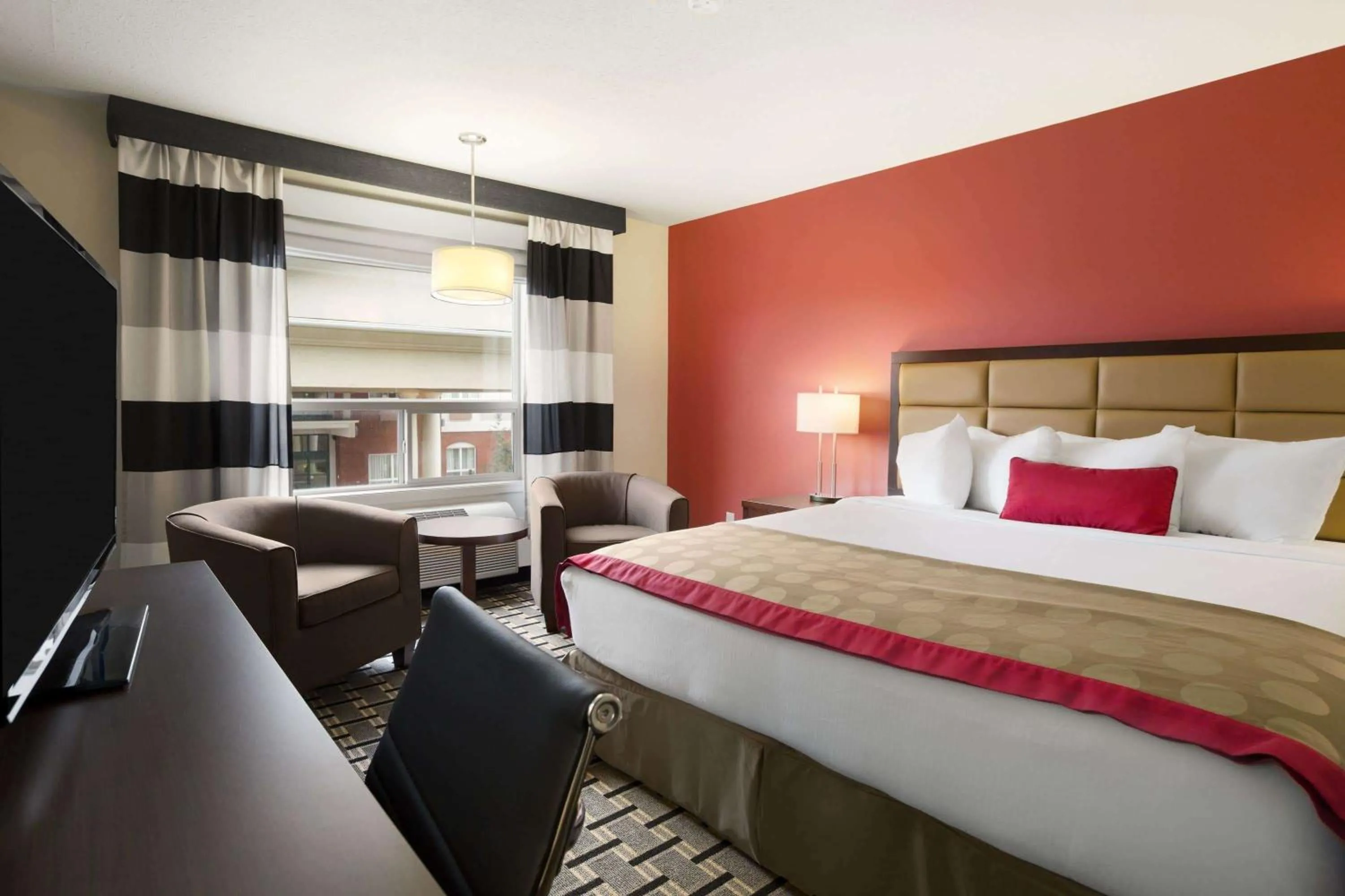 Photo of the whole room, Bed in Ramada by Wyndham Edson