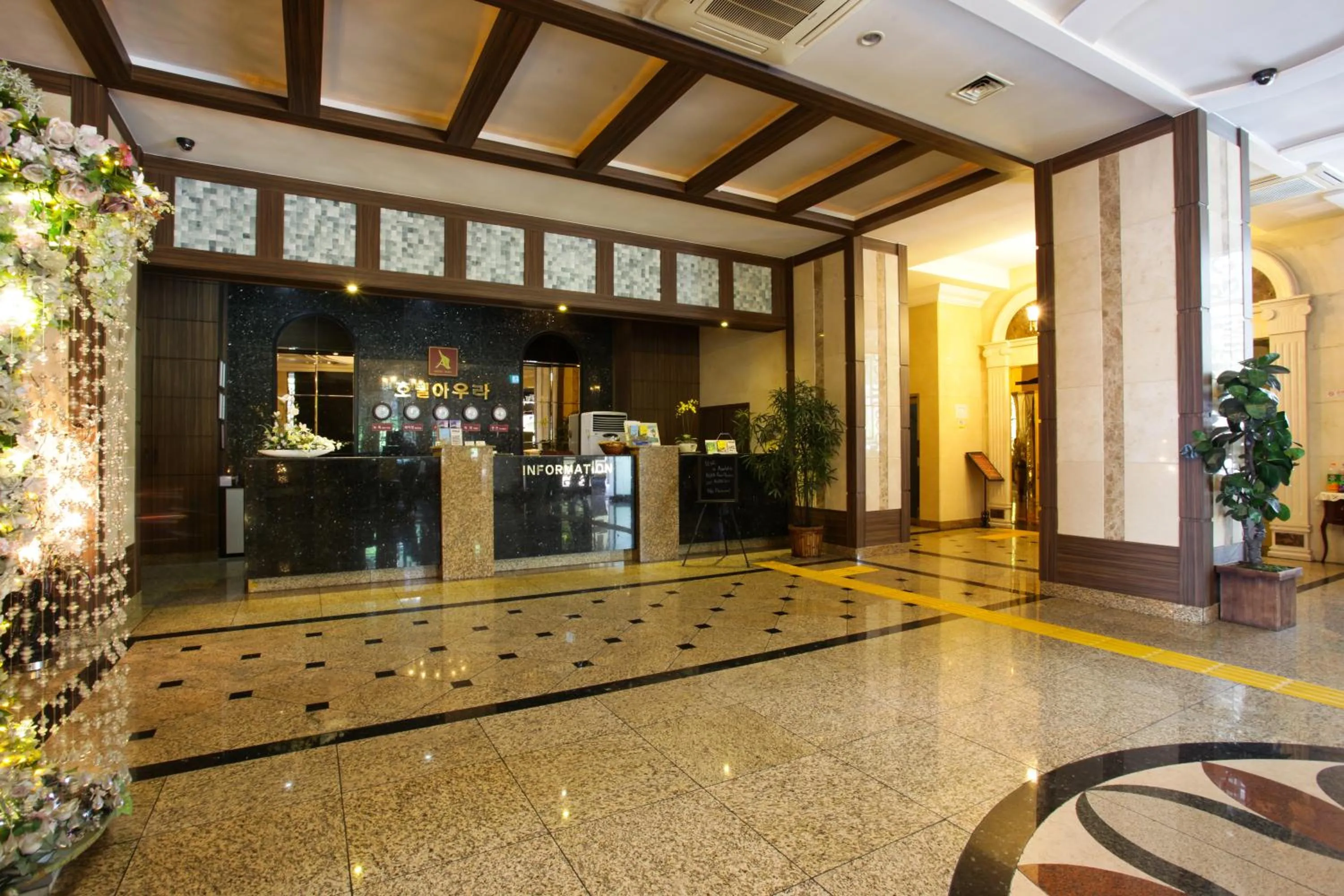 Communal lounge/ TV room in Aura Hotel