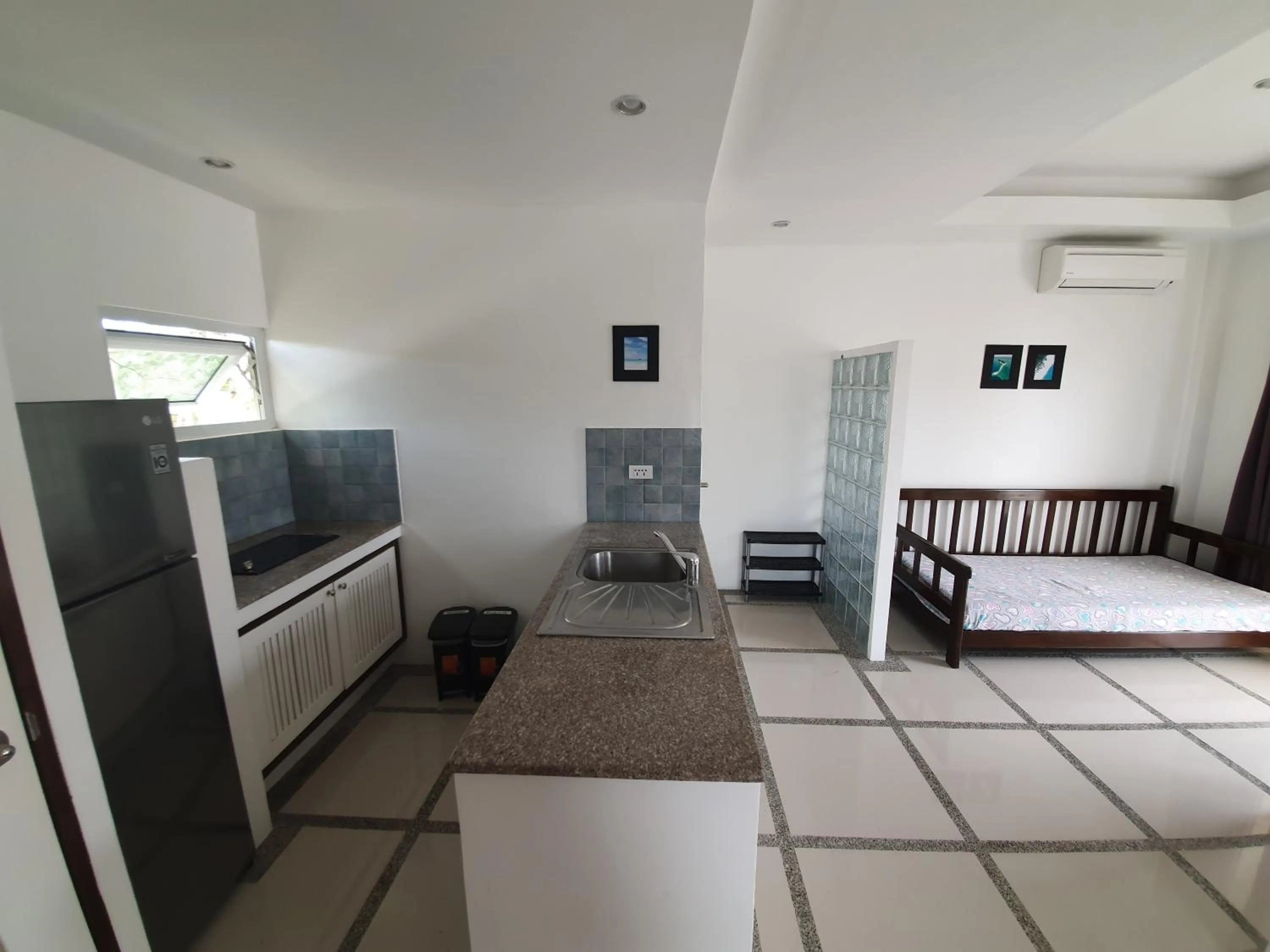 Living room, Bed in ClubBoracay Apartelle