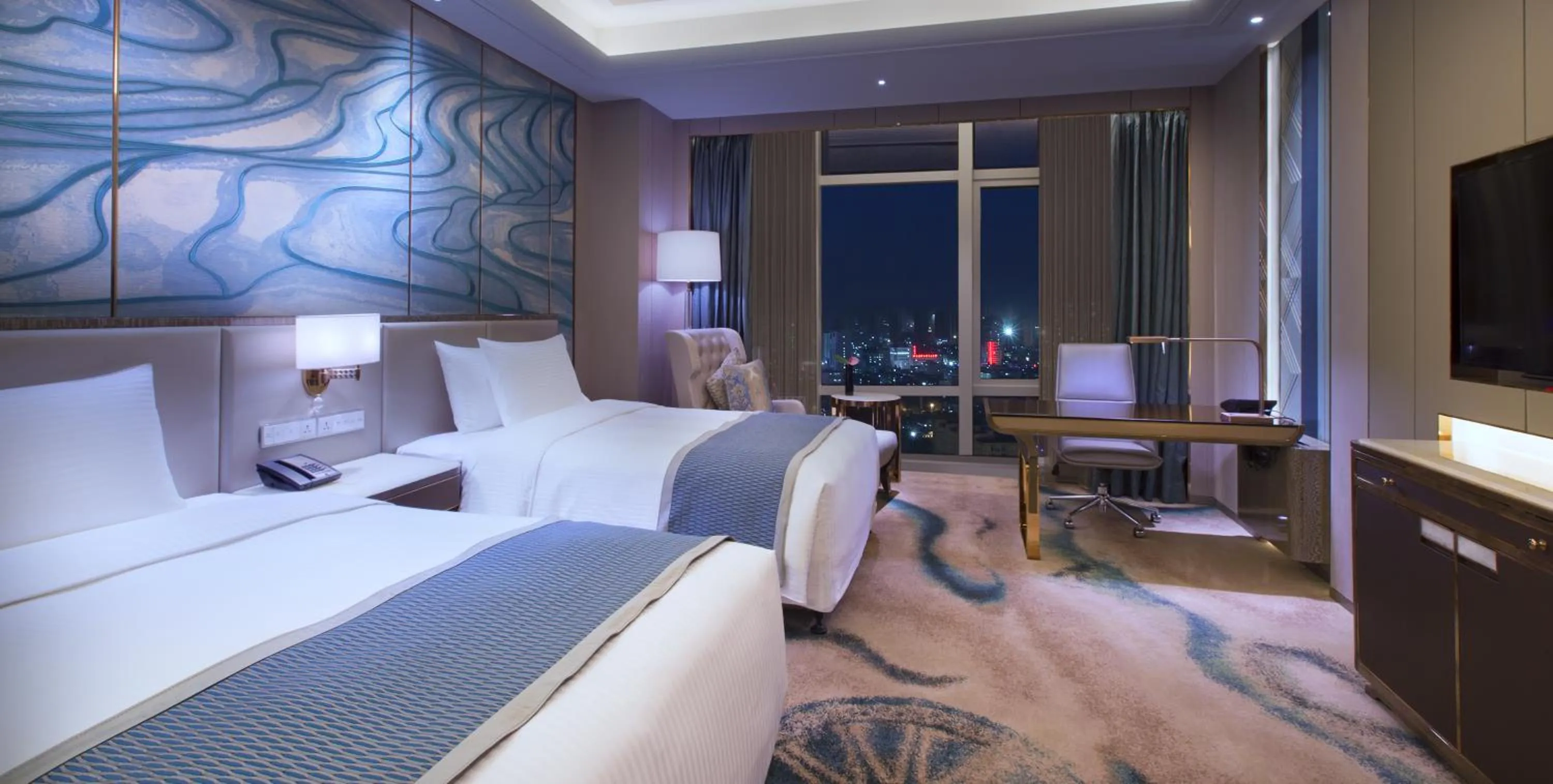 Photo of the whole room, Bed in Wanda Vista Nanning