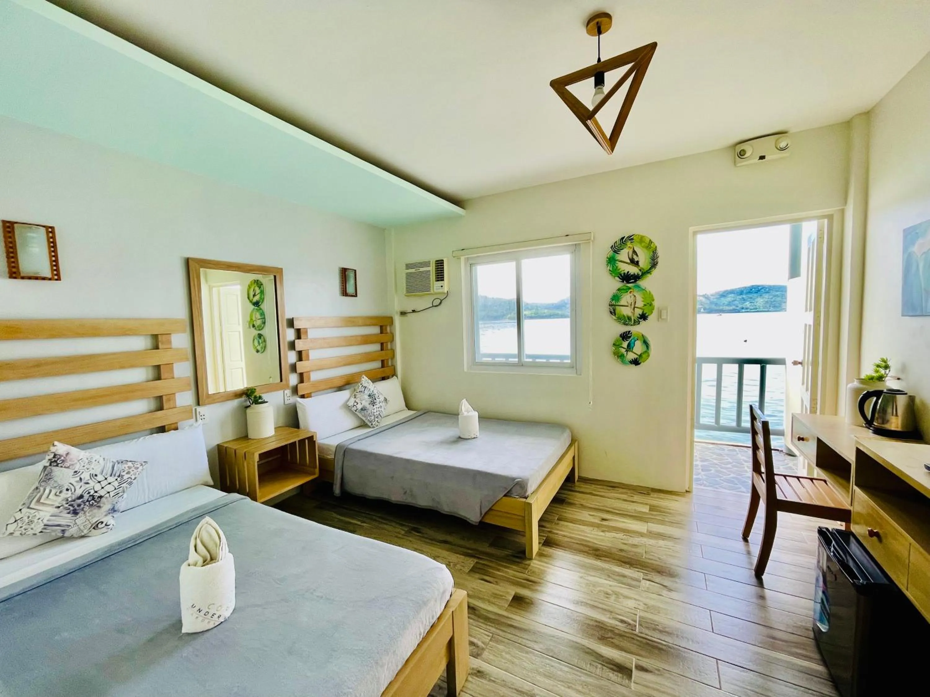 Photo of the whole room, Bed in Coron Underwater Garden Resort