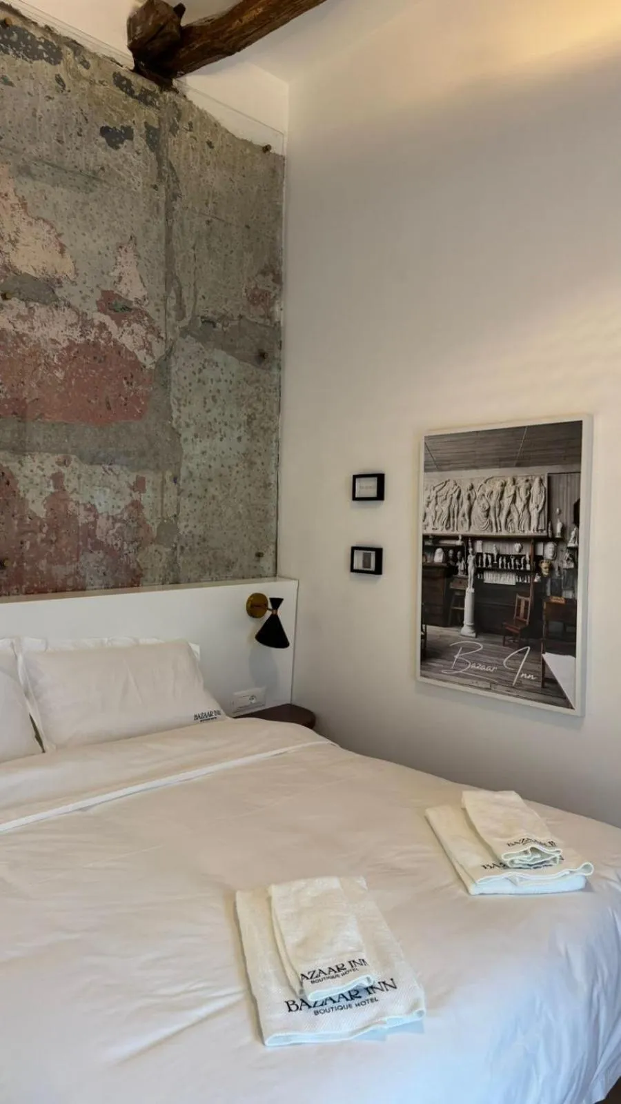 Bed in Bazaar Inn Hotel