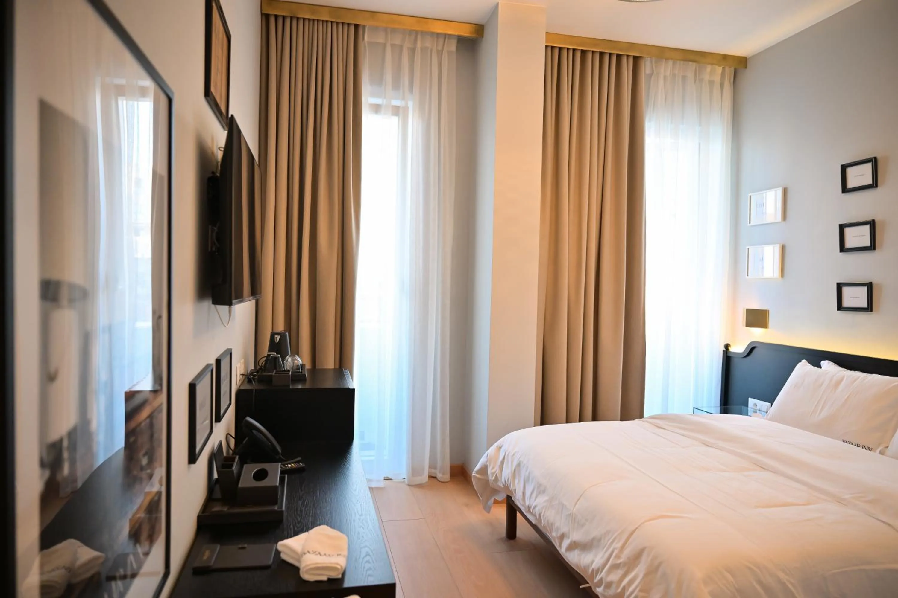 Bed in Bazaar Inn Hotel