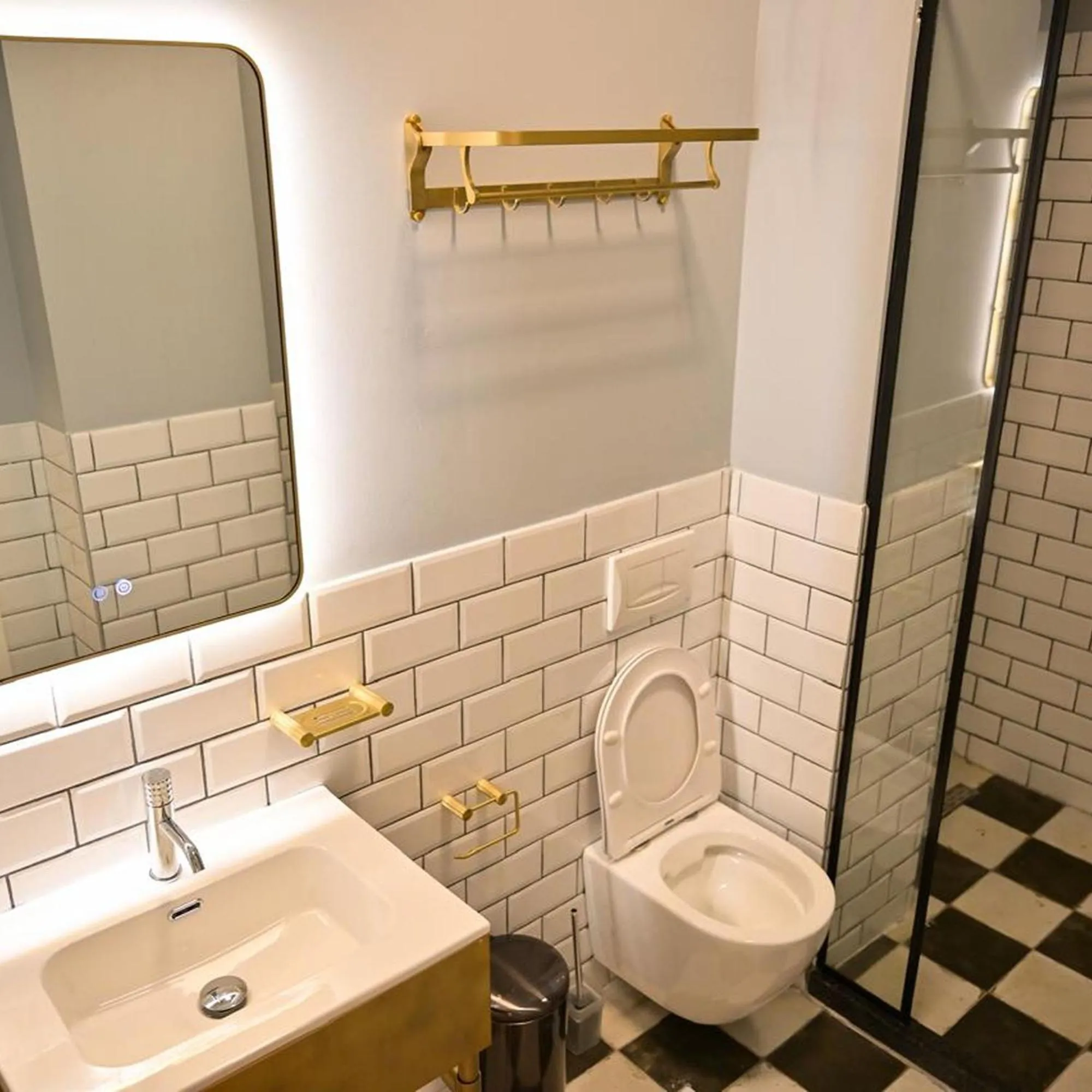 Toilet in Bazaar Inn Hotel