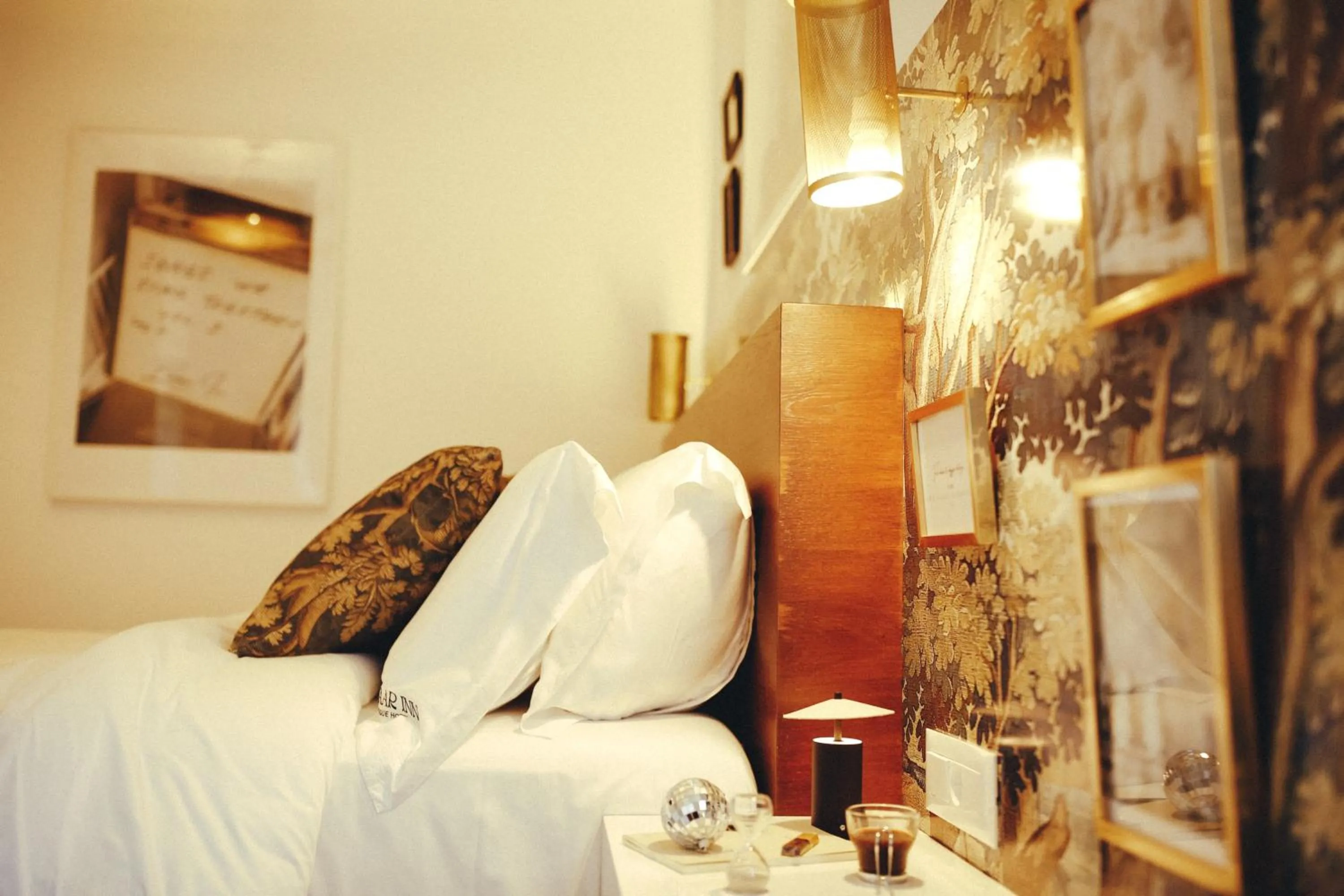 Bed in Bazaar Inn Hotel